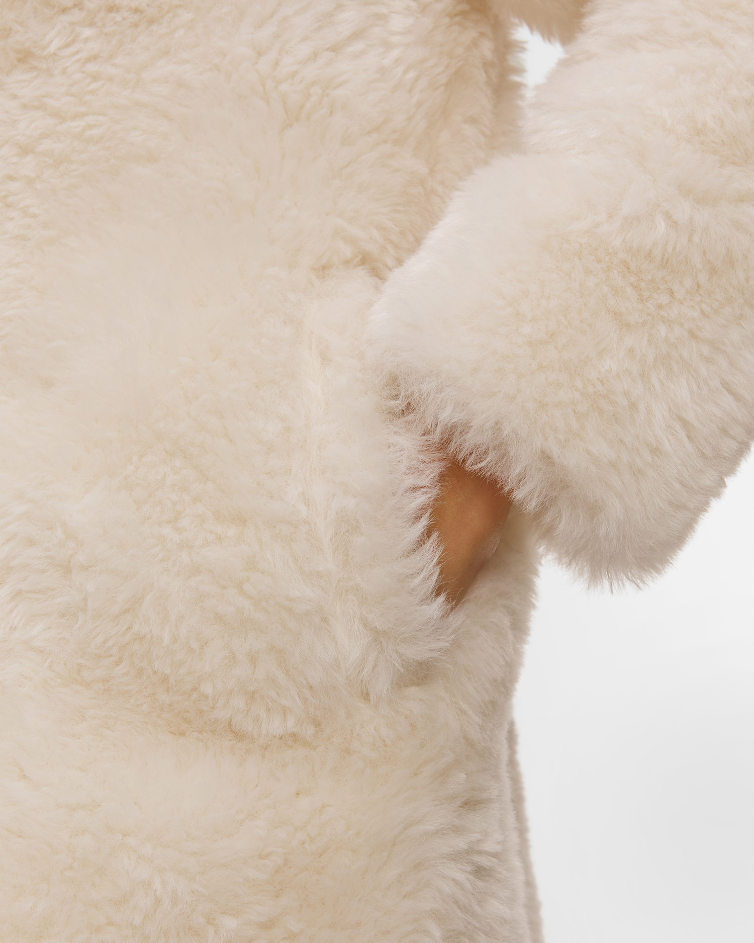 Women's beige fur coat Sportalm