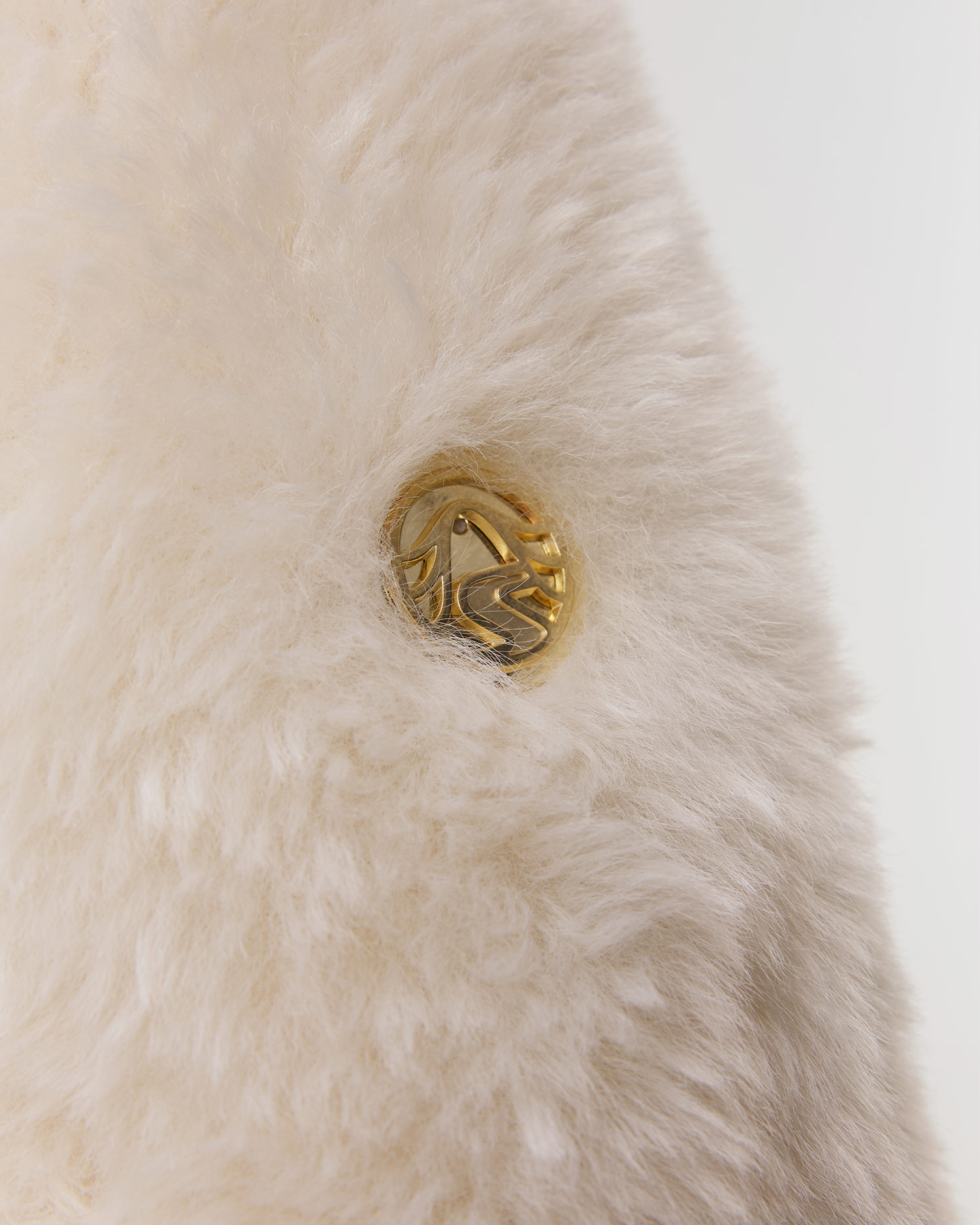 Women's beige fur coat Sportalm