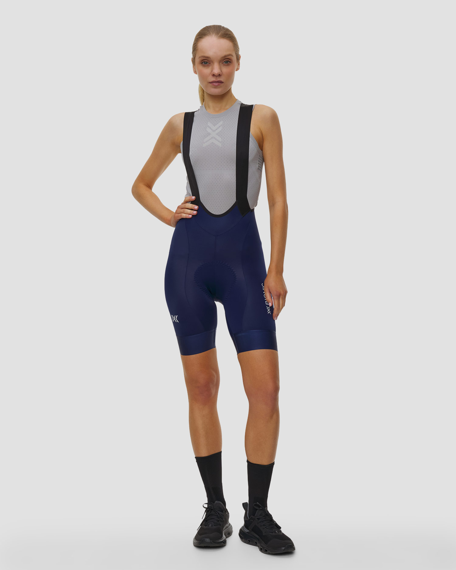 Dámské cyklistické kraťasy se šlemi X-Bionic Corefusion Ride Bib Shorts v tmavě modré barvě, Barva/Vzor: Granatowy
