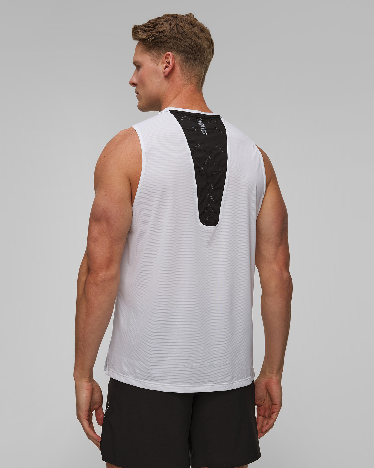 X-Bionic Corefusion Run Tank Unisex Lauf-Singlet in Weiß und Schwarz