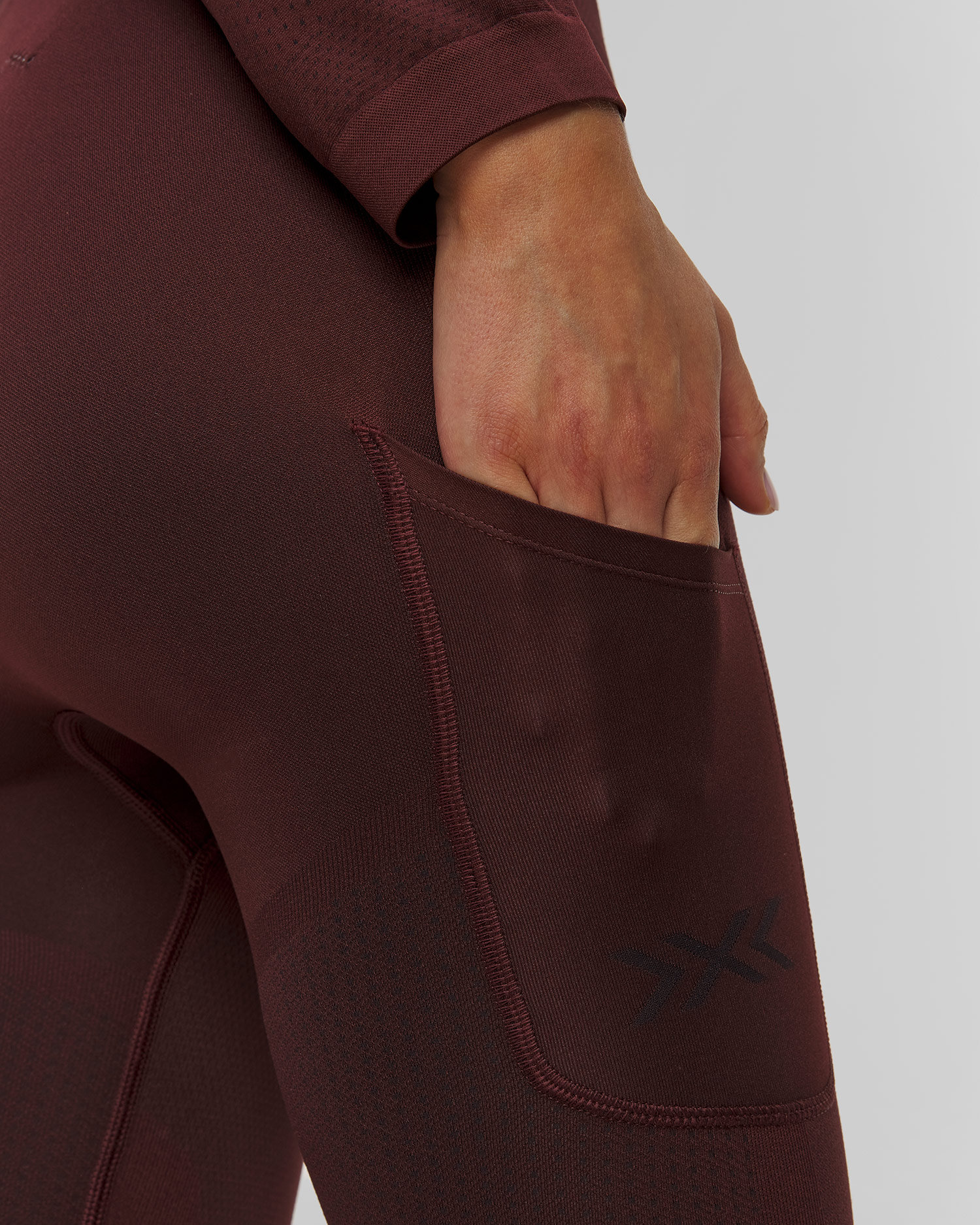 Leginsy biegowe damskie X-Bionic Xceed Run Long Tights bordowe