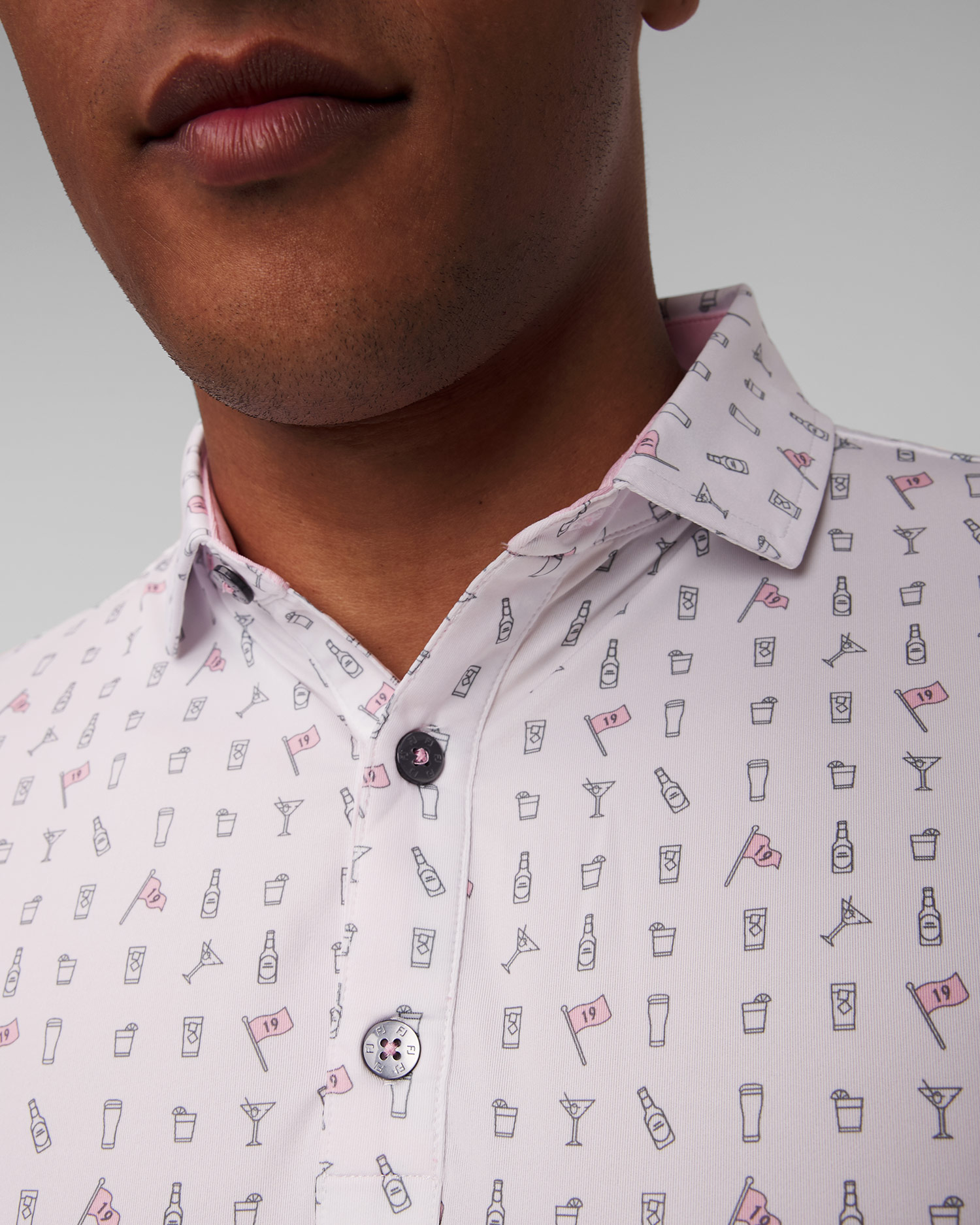 Men’s white polo by FootJoy Eu The 19th Hole