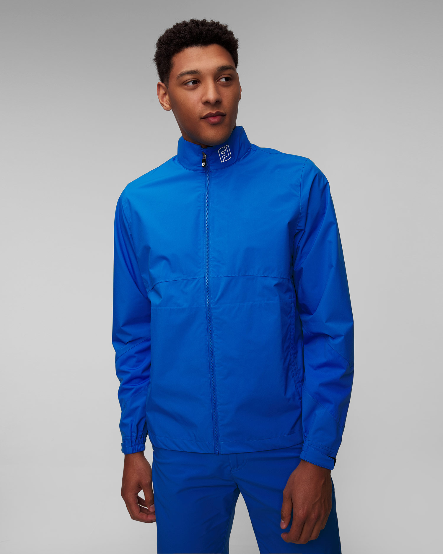 Niebieska kurtka przeciwdeszczowa męska FootJoy Eu HydroLite X
