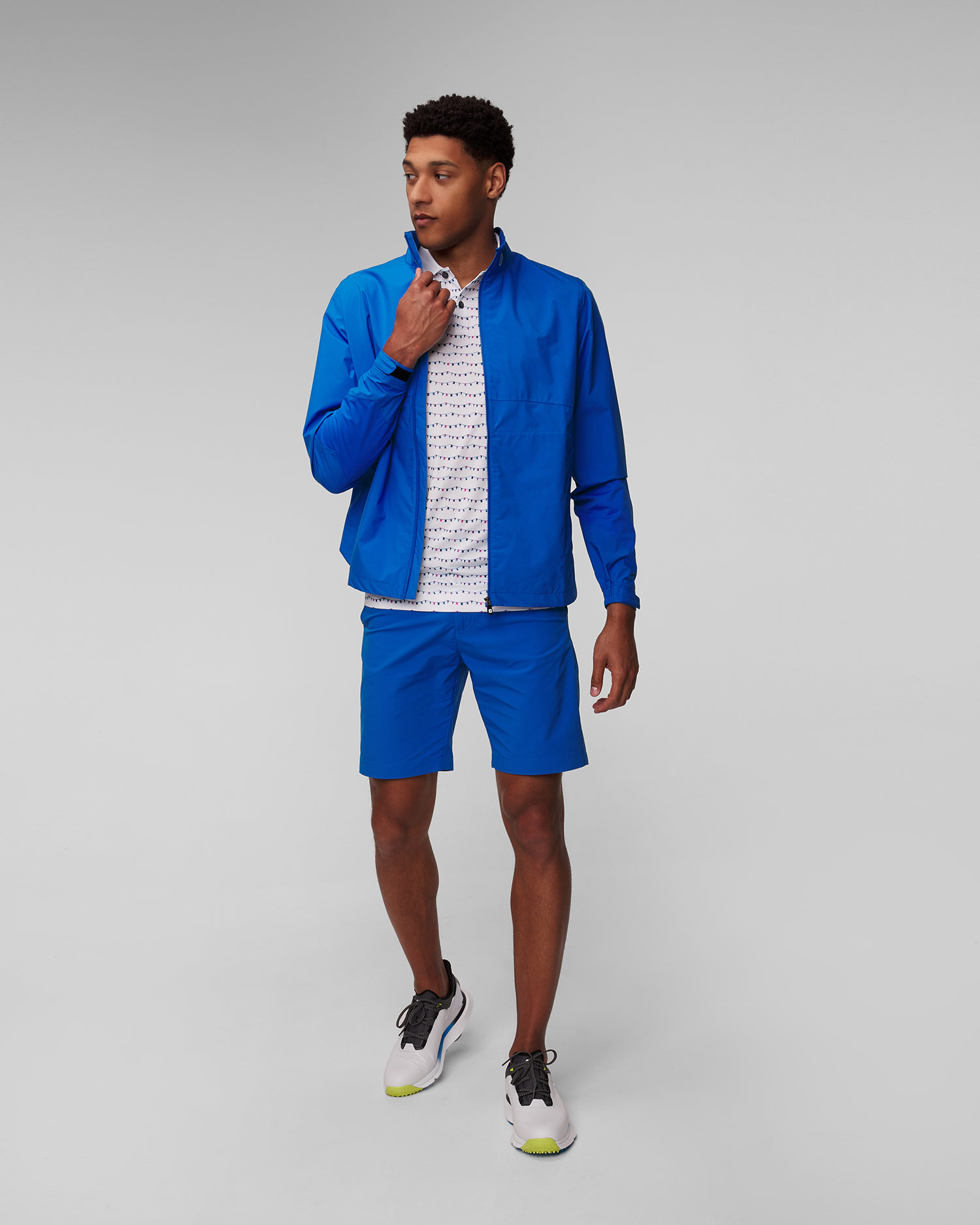 Niebieska kurtka przeciwdeszczowa męska FootJoy Eu HydroLite X