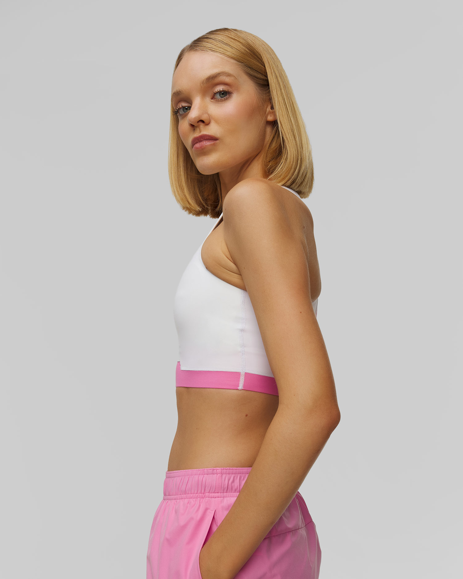 Top da donna On Train 2-in-1 Crop bianco-rosa