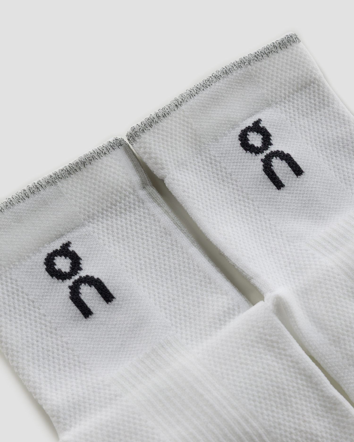 Calzini da corsa On Performance Run Sock Mid bianchi