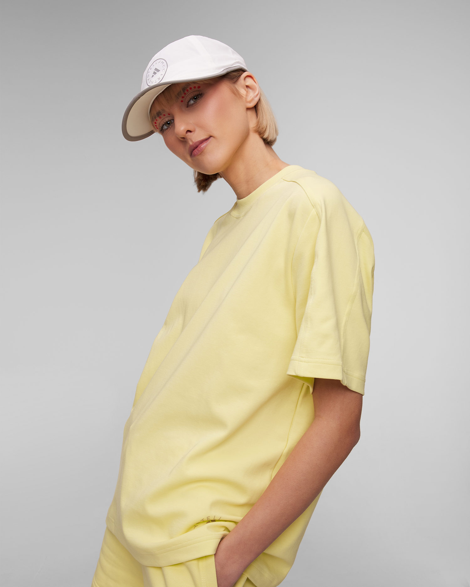 Żółty T-shirt damski Adidas by Stella McCartney ASMC Logo Tee