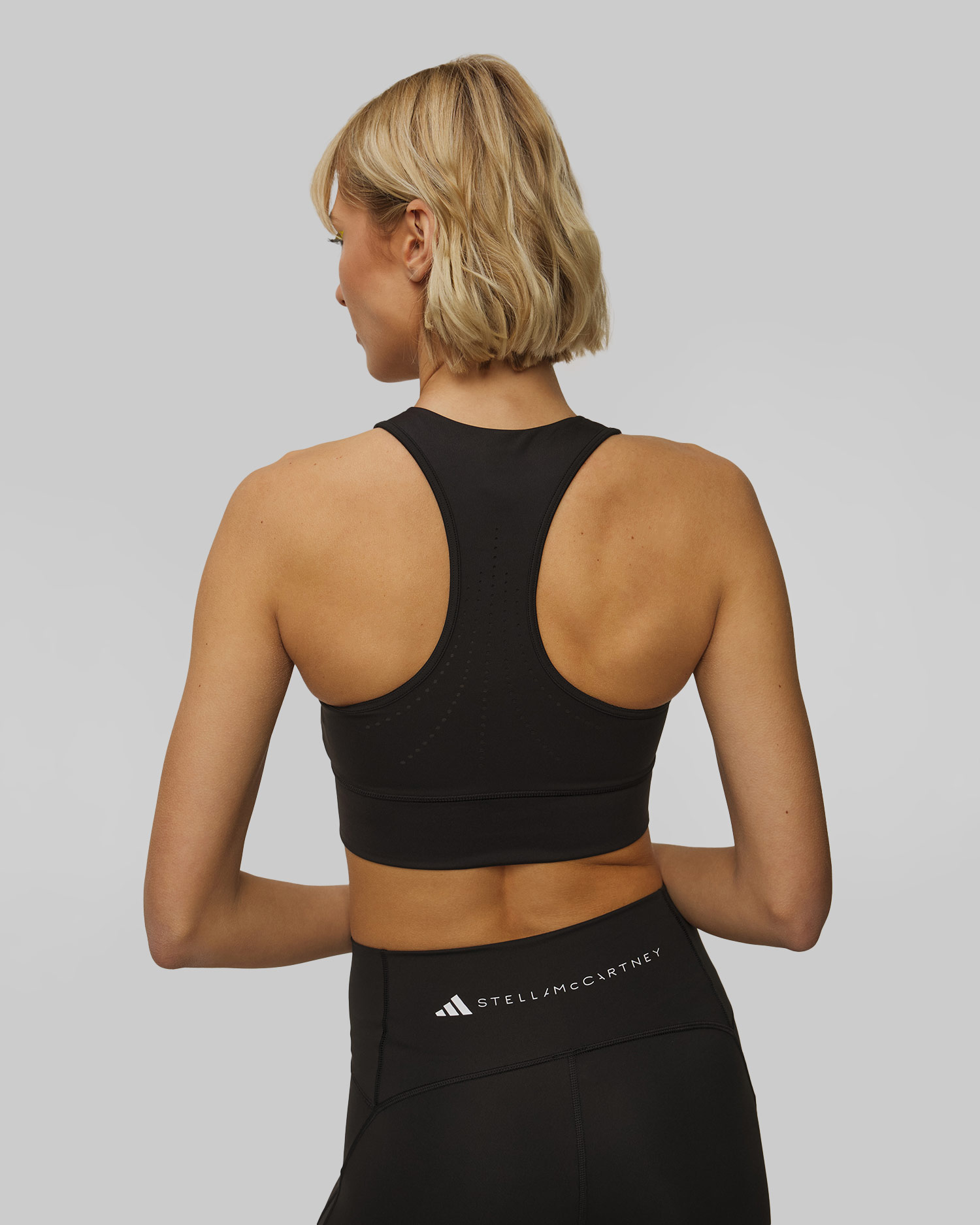 Černý dámský sportovní top Adidas by Stella McCartney TruePurpose Crop