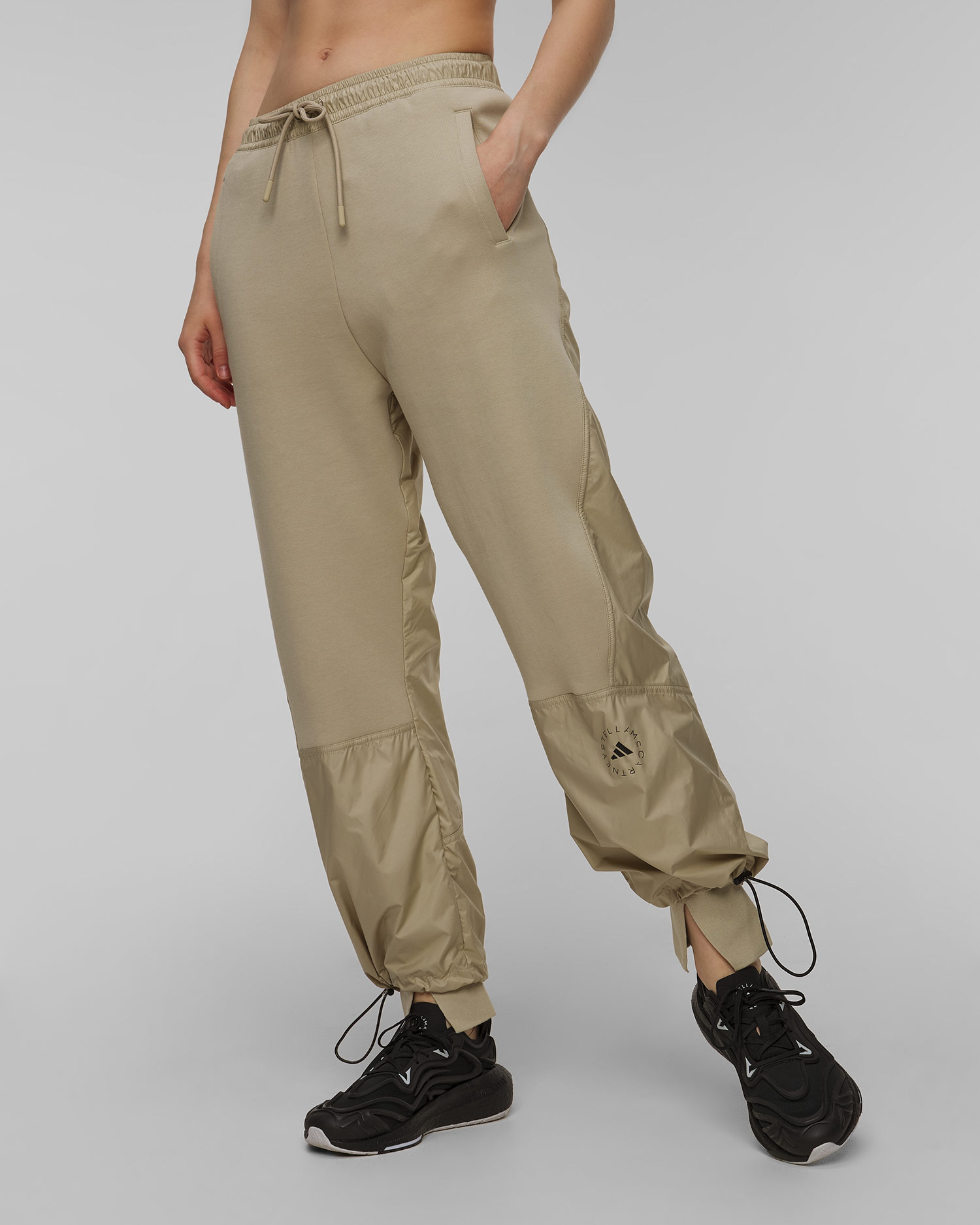 Dámske teplákové nohavice Adidas by Stella McCartney Material Mix Pants