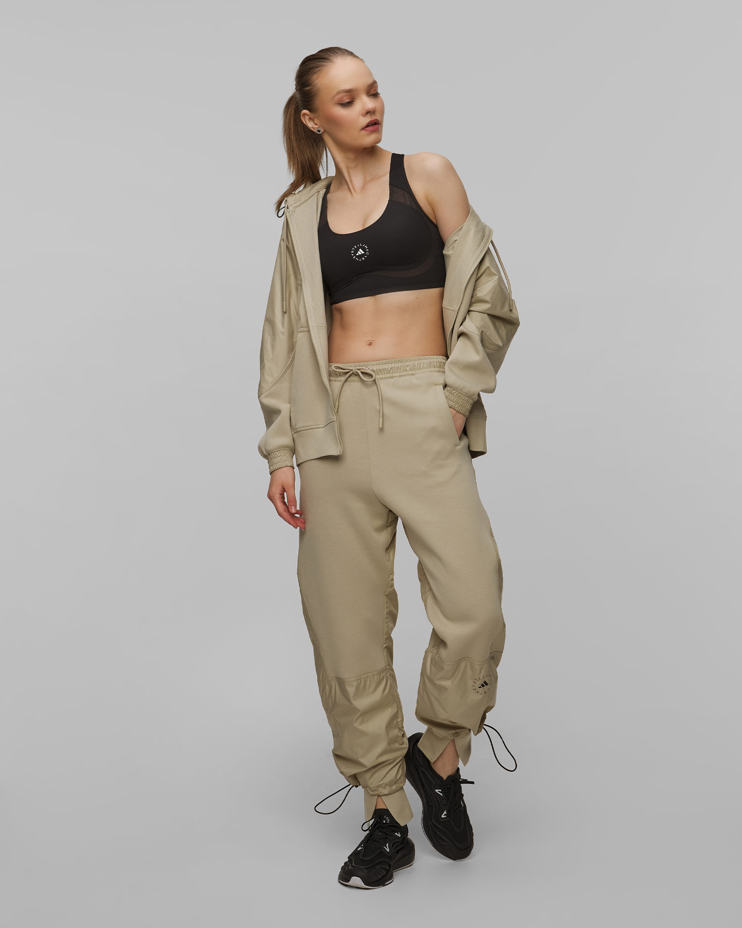 Dámske teplákové nohavice Adidas by Stella McCartney Material Mix Pants