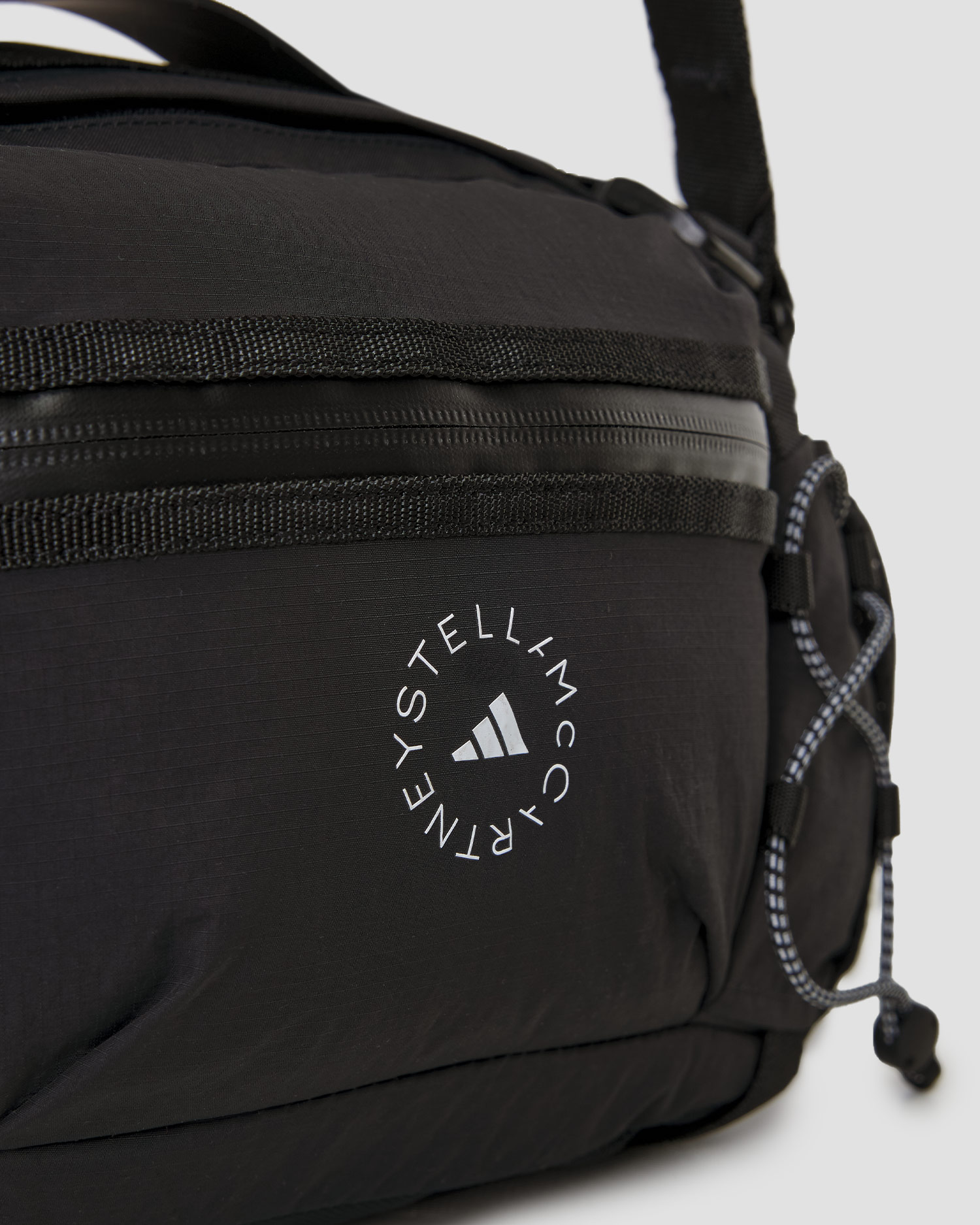 Dámska ľadvinka Adidas by Stella McCartney Multi 2in1 9L čierna