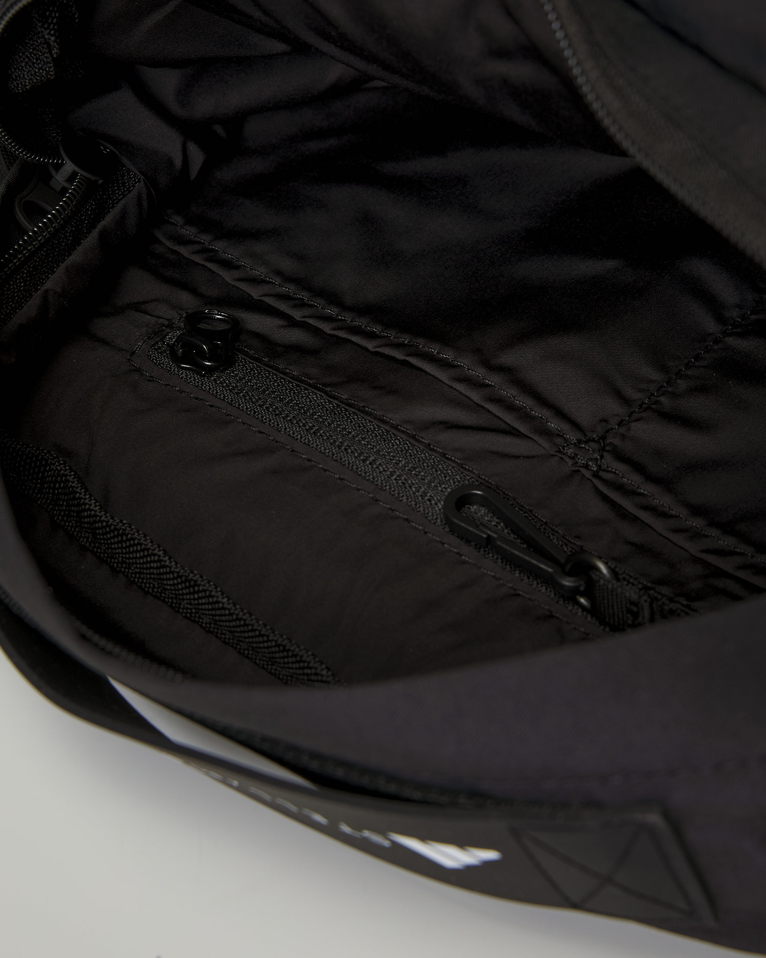 Dámska ľadvinka Adidas by Stella McCartney Multi 2in1 9L čierna