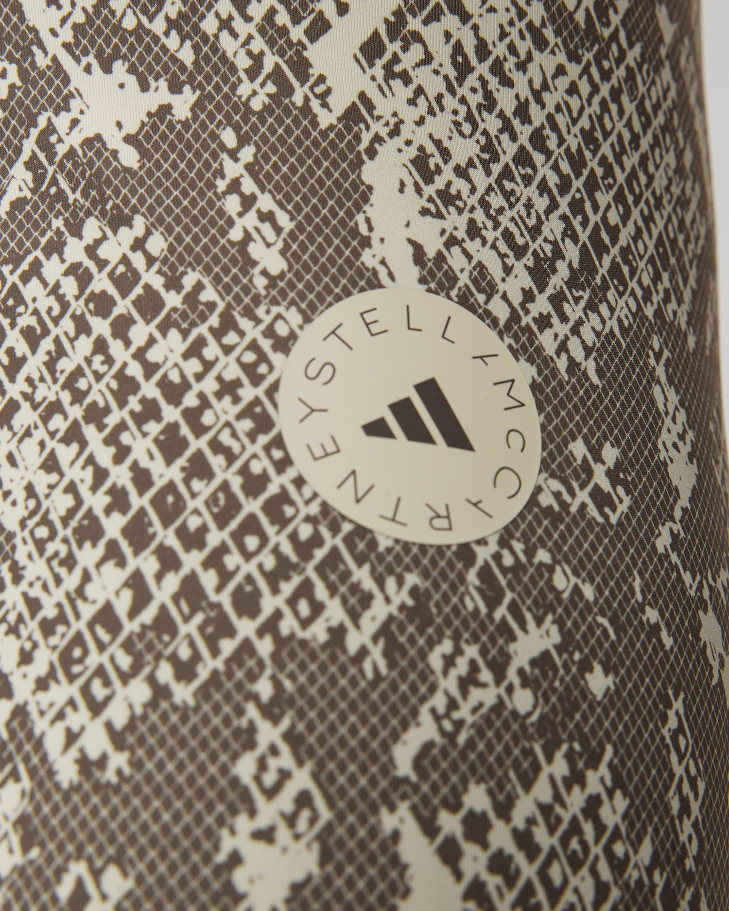 Dámské legíny s potiskem Adidas by Stella McCartney