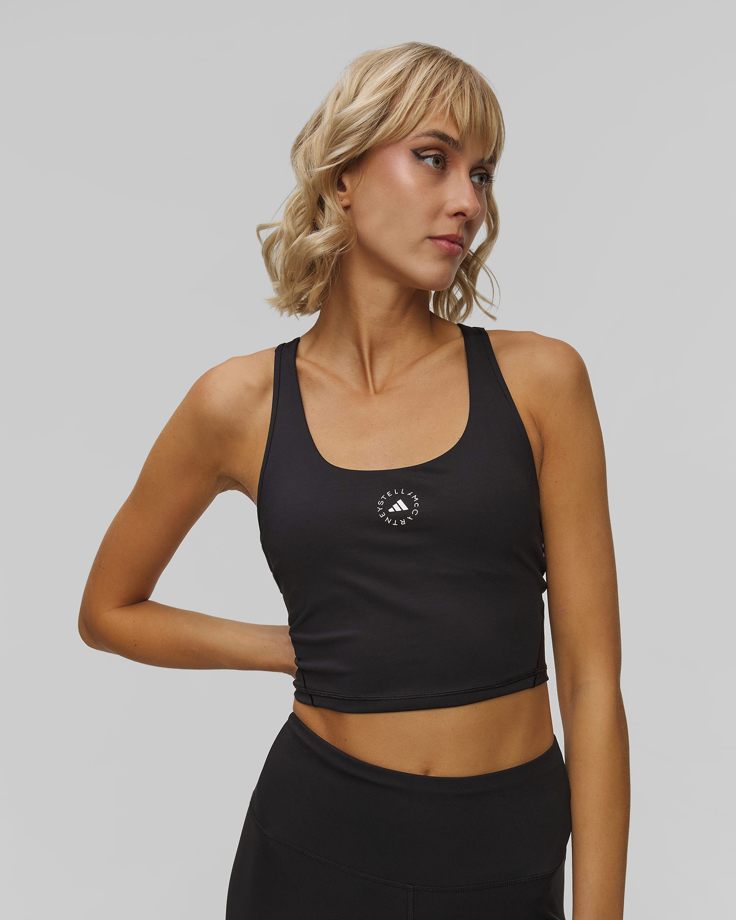 Czarny top treningowy damski Adidas by Stella McCartney Yoga Crop