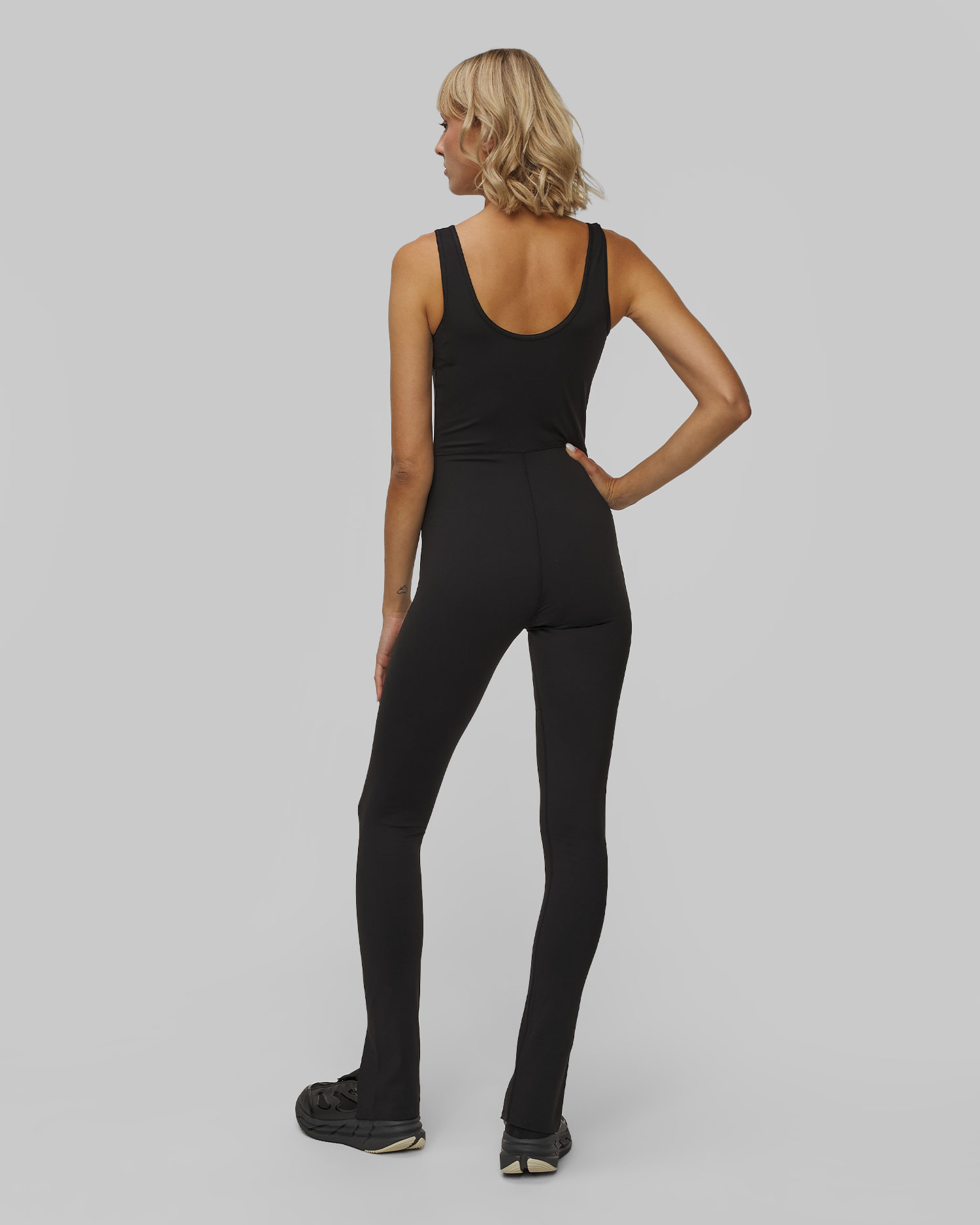 Czarny kombinezon treningowy damski Adidas by Stella McCartney TruePurpose