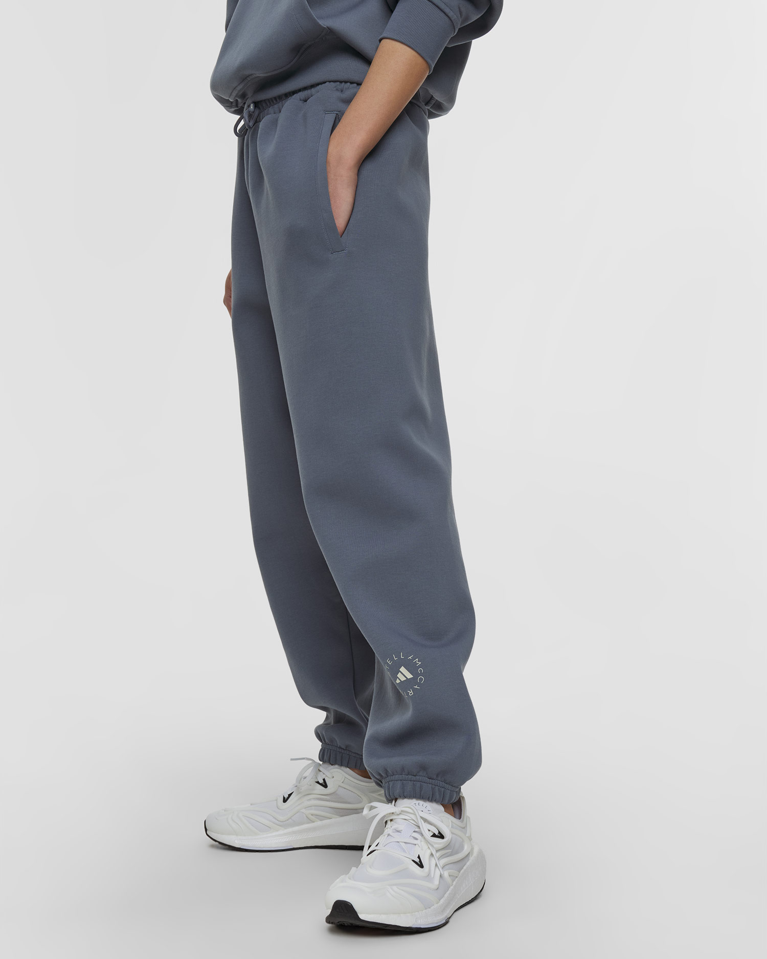 Dámske tepláky Adidas by Stella McCartney ASMC