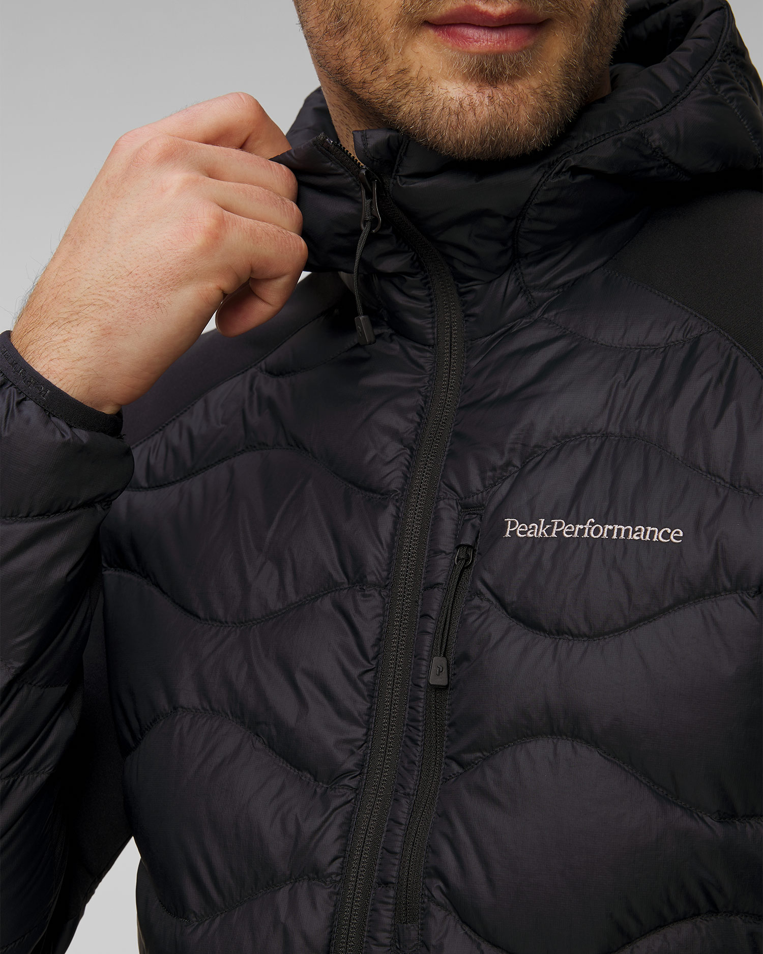 Giacca ibrida da uomo Peak Performance Helium Down Hybrid Hood