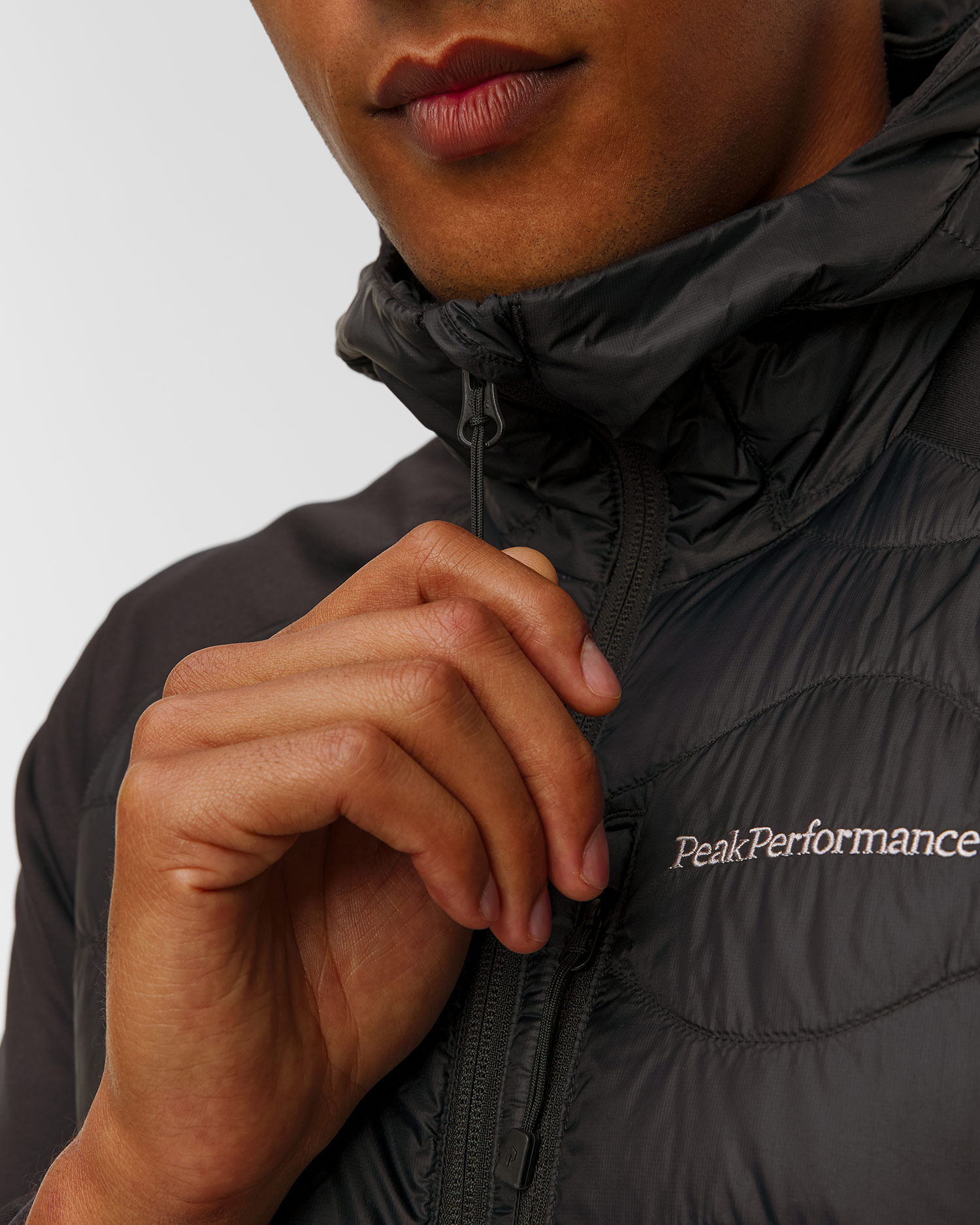 Giacca ibrida da uomo Peak Performance Helium Down Hybrid Hood