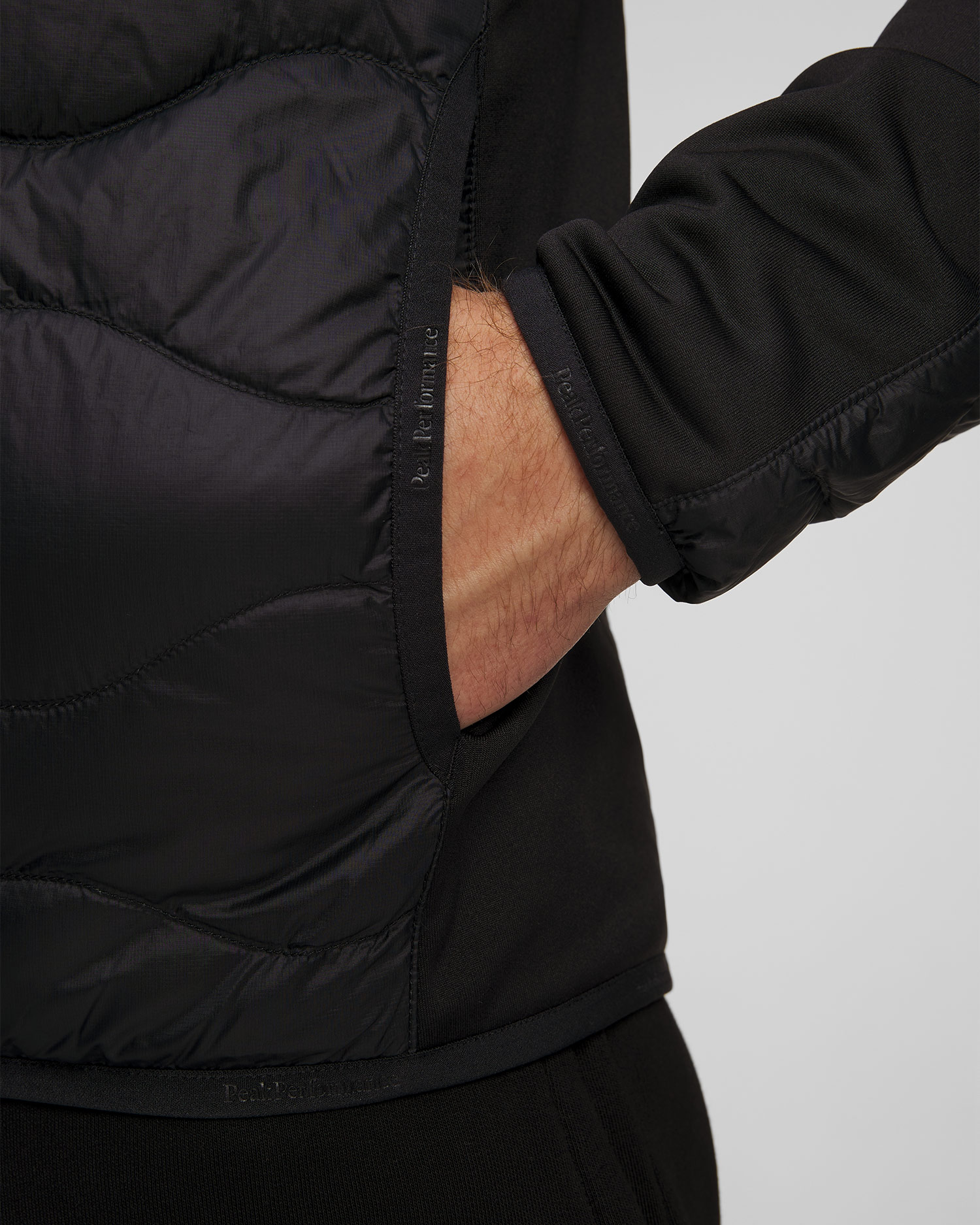 Giacca ibrida da uomo Peak Performance Helium Down Hybrid Hood