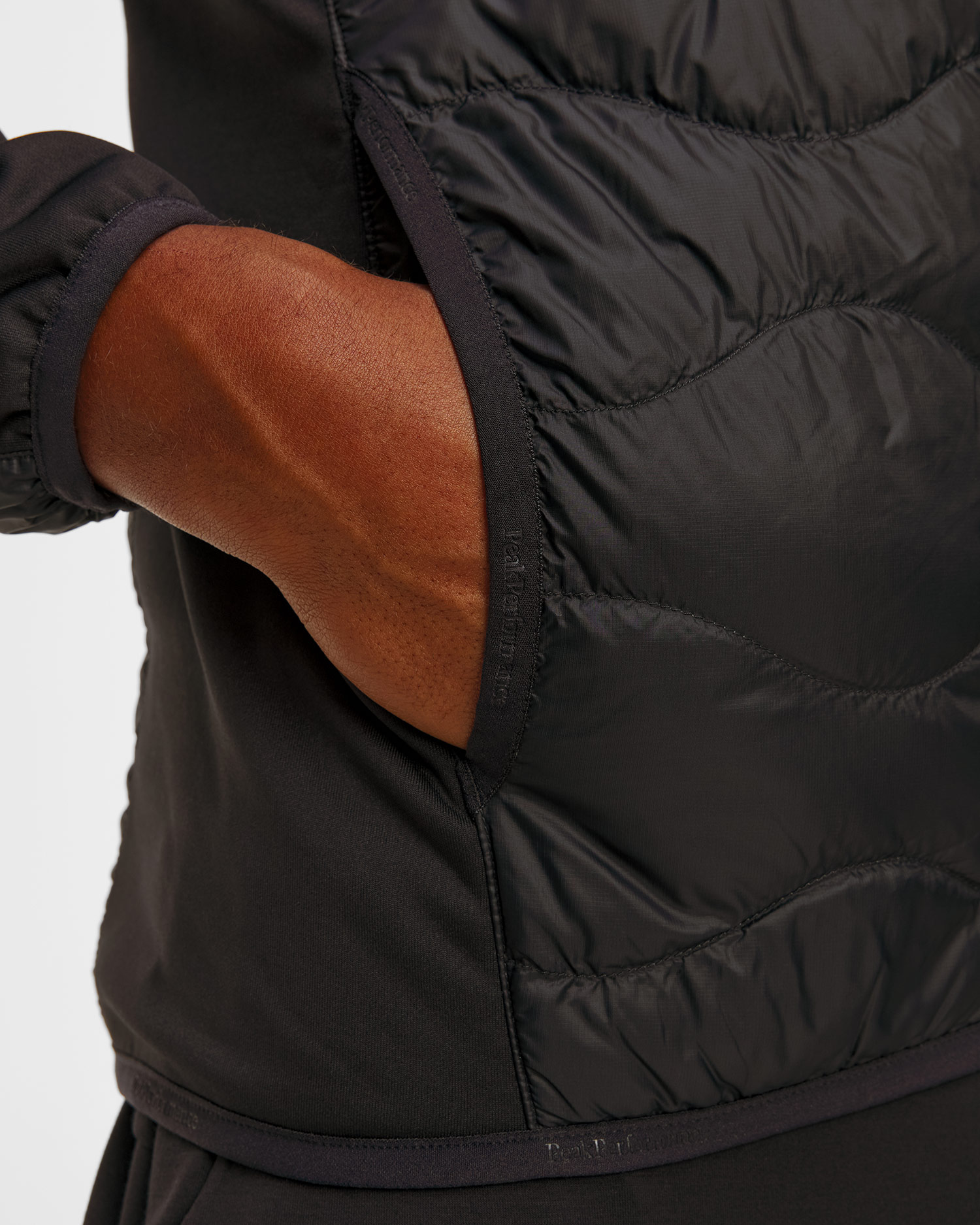 Giacca ibrida da uomo Peak Performance Helium Down Hybrid Hood