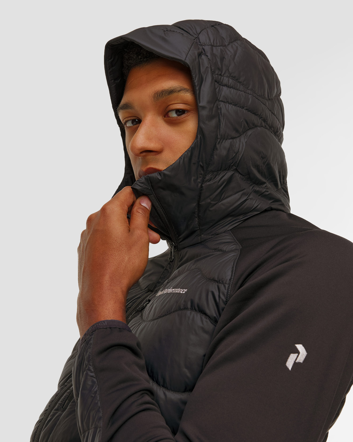 Giacca ibrida da uomo Peak Performance Helium Down Hybrid Hood