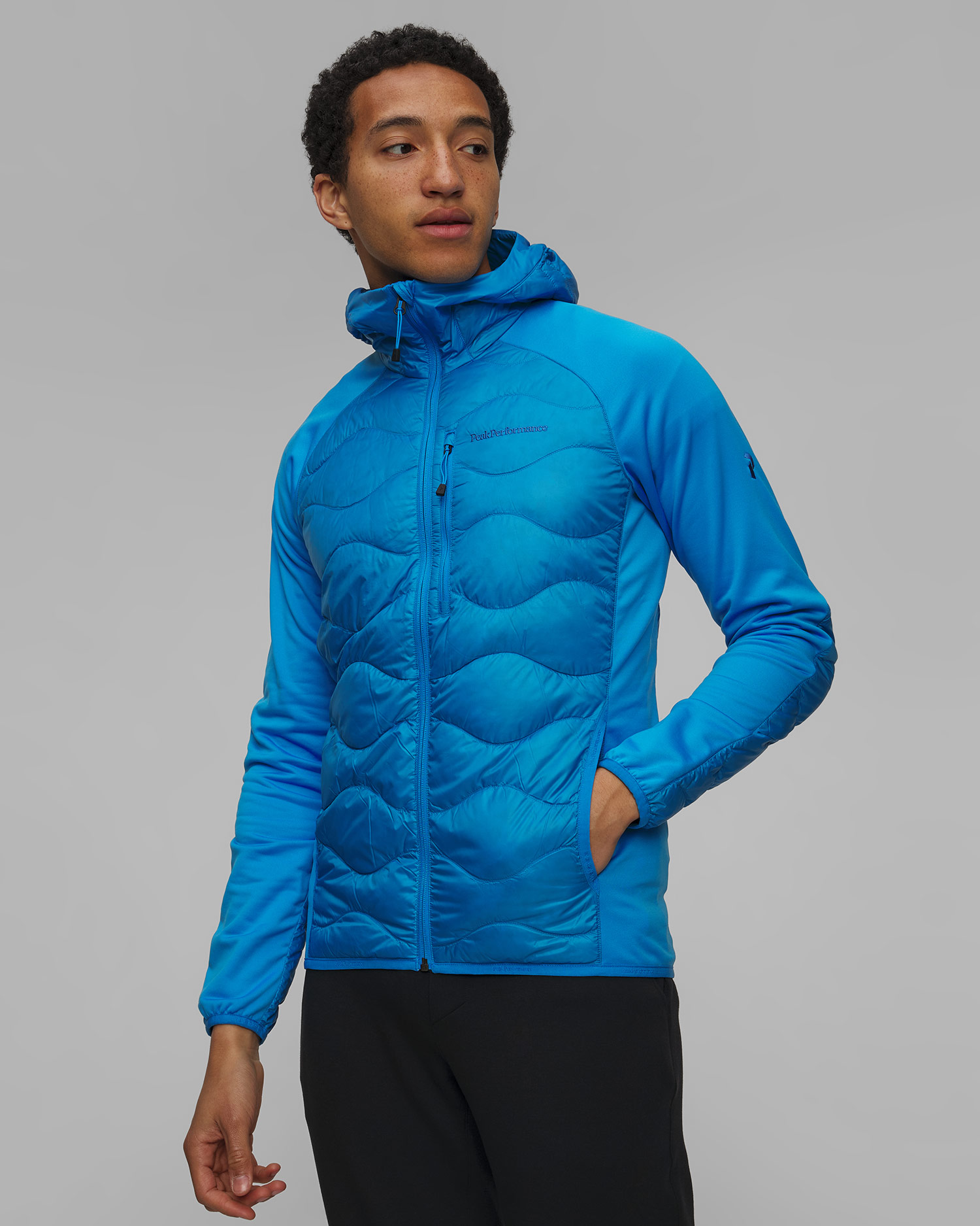 Kurtka hybrydowa z kapturem Peak Performance Helium Down Hybrid Hood