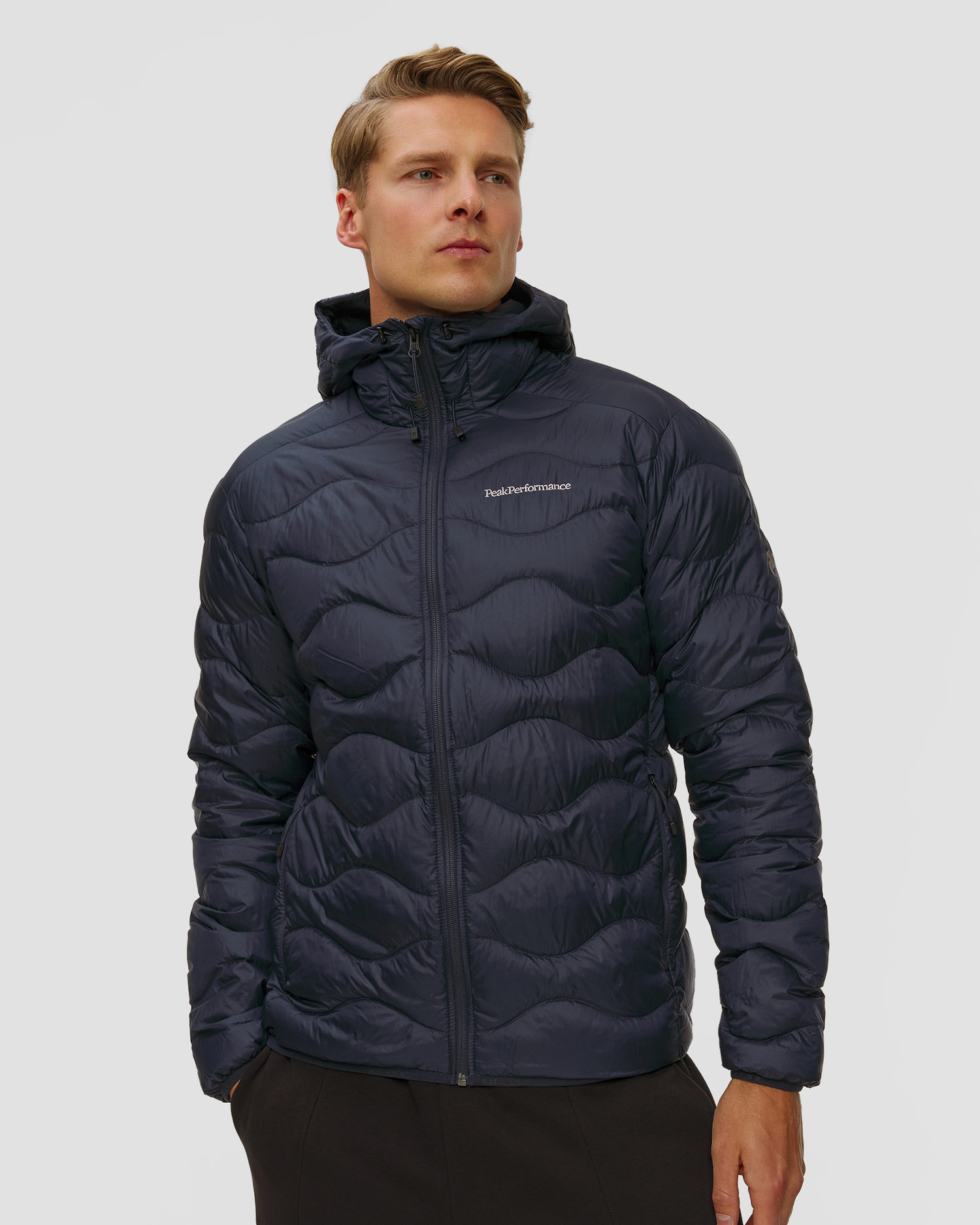 Pánska páperová bunda s kapucňou Peak Performance Helium Down Hood Jacket