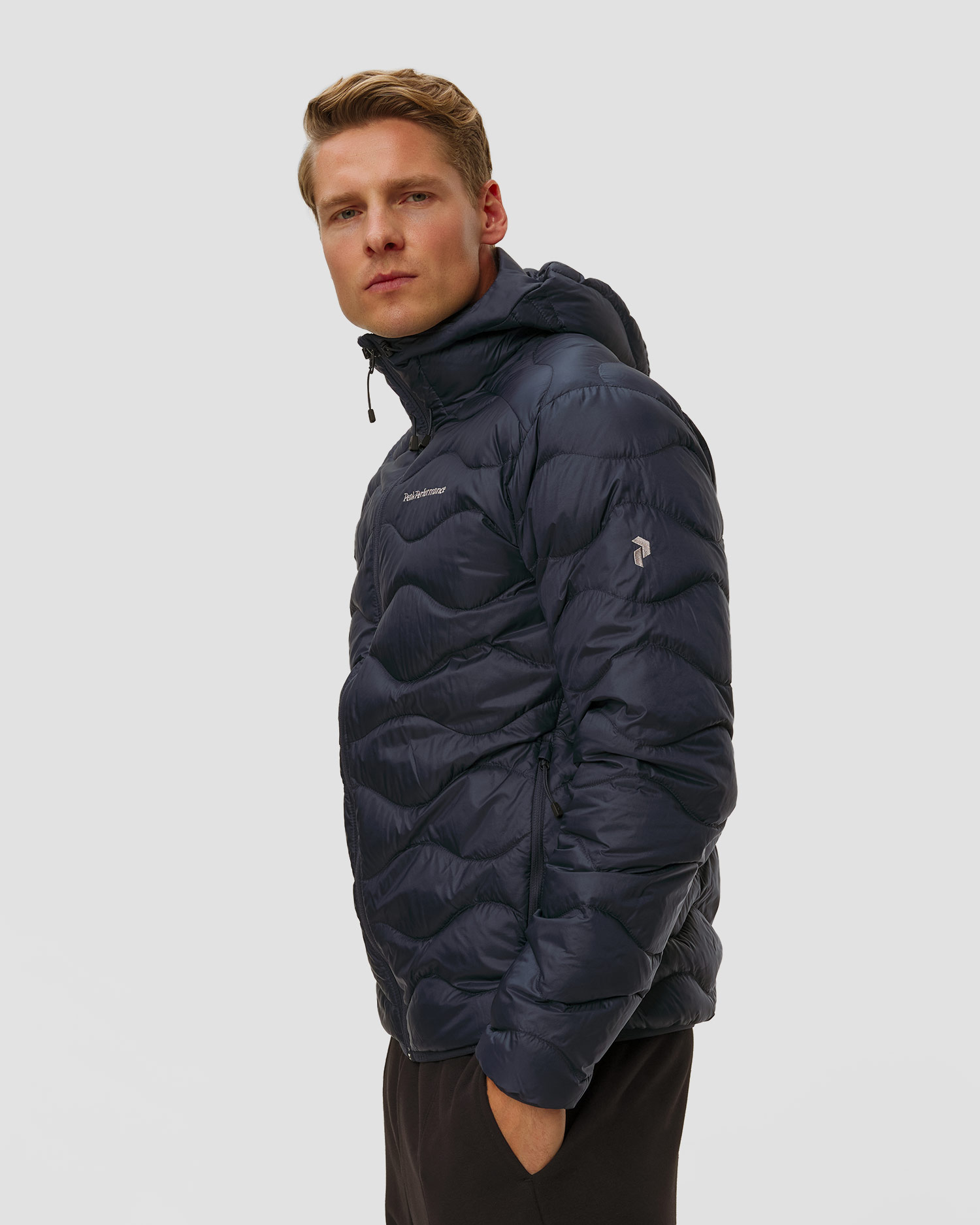 Pánska páperová bunda s kapucňou Peak Performance Helium Down Hood Jacket