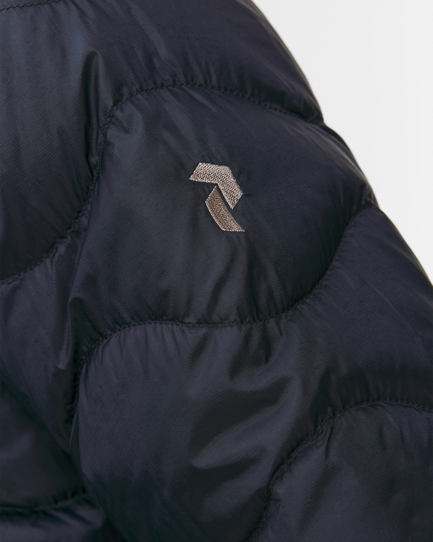 Pánska páperová bunda s kapucňou Peak Performance Helium Down Hood Jacket