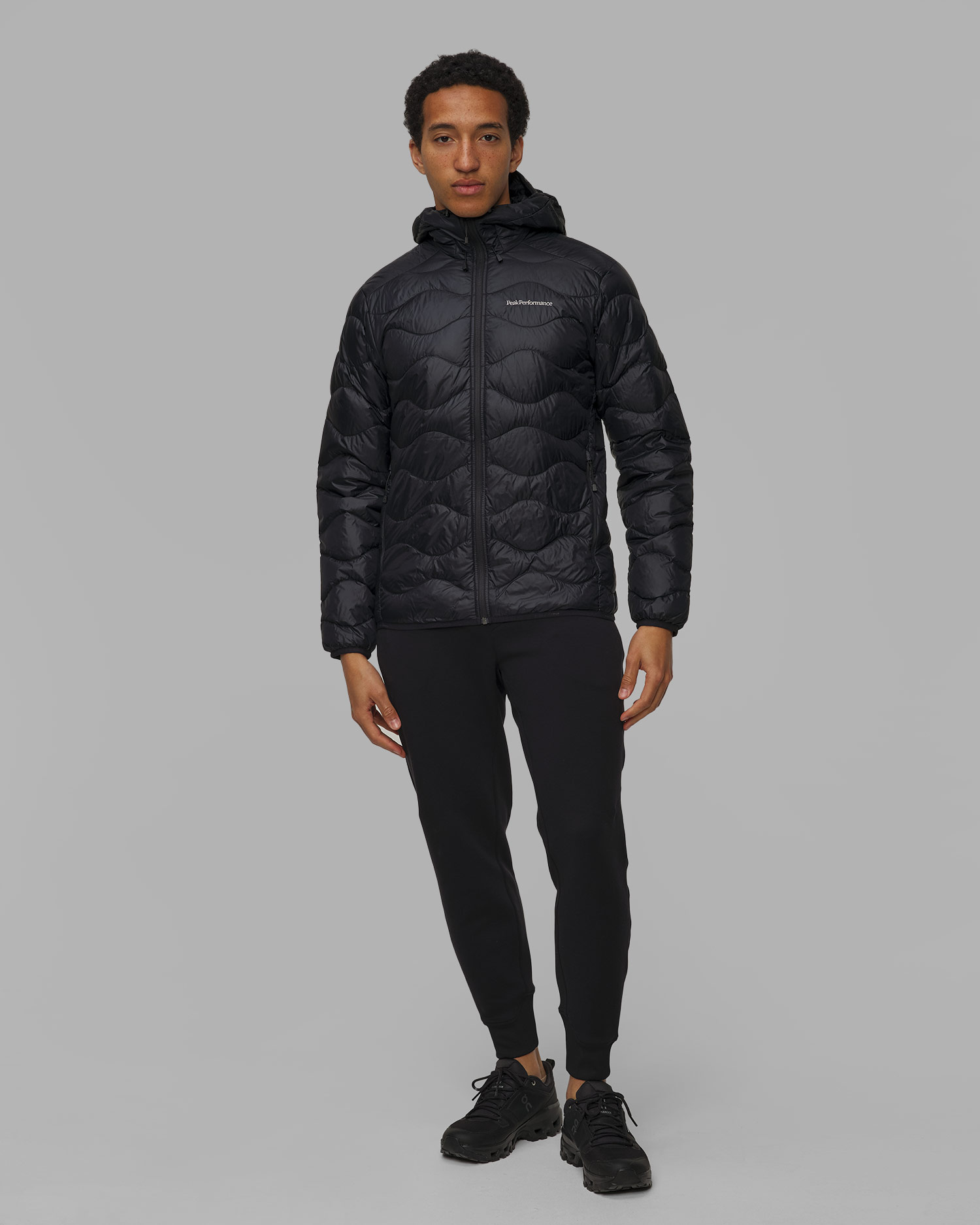 Černá pánská prošívaná bunda Peak Performance Helium Down Hood Jacket