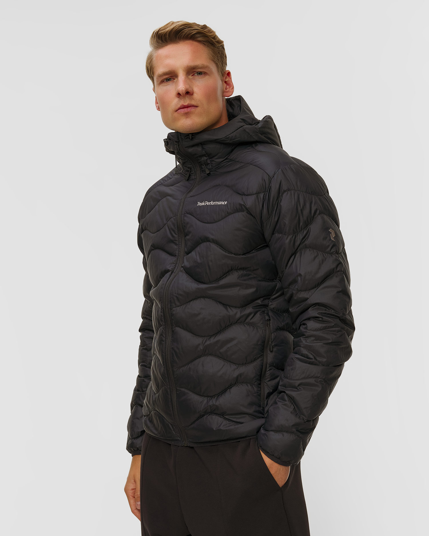 Pánska páperová bunda s kapucňou Peak Performance Helium Down Hood Jacket