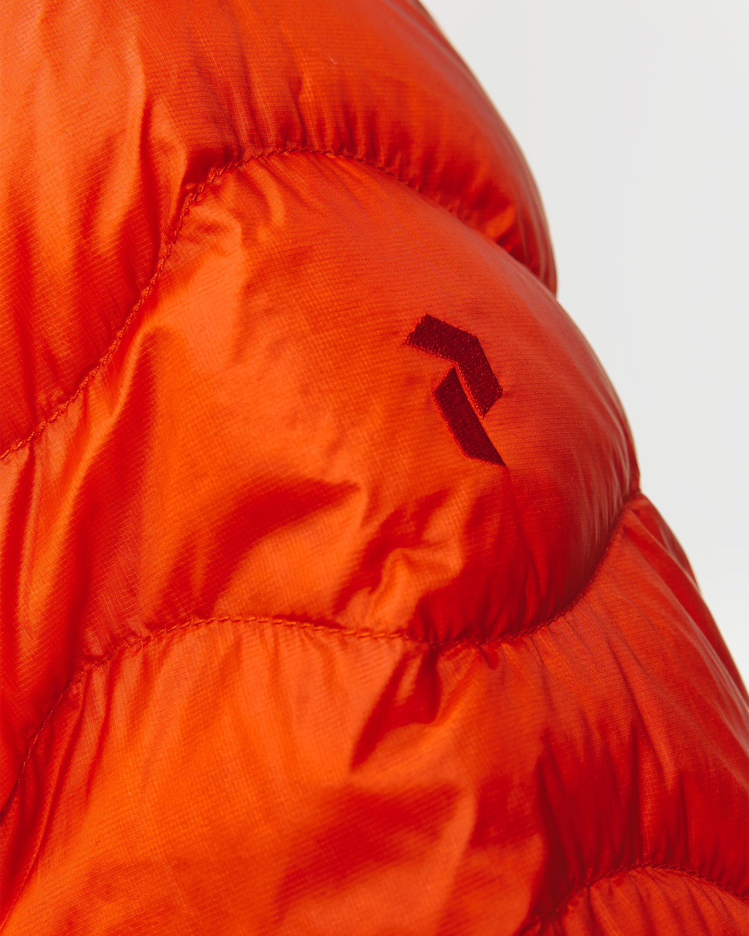 Pánska páperová bunda Peak Performance Helium Down Hood Jacket Men oranžová