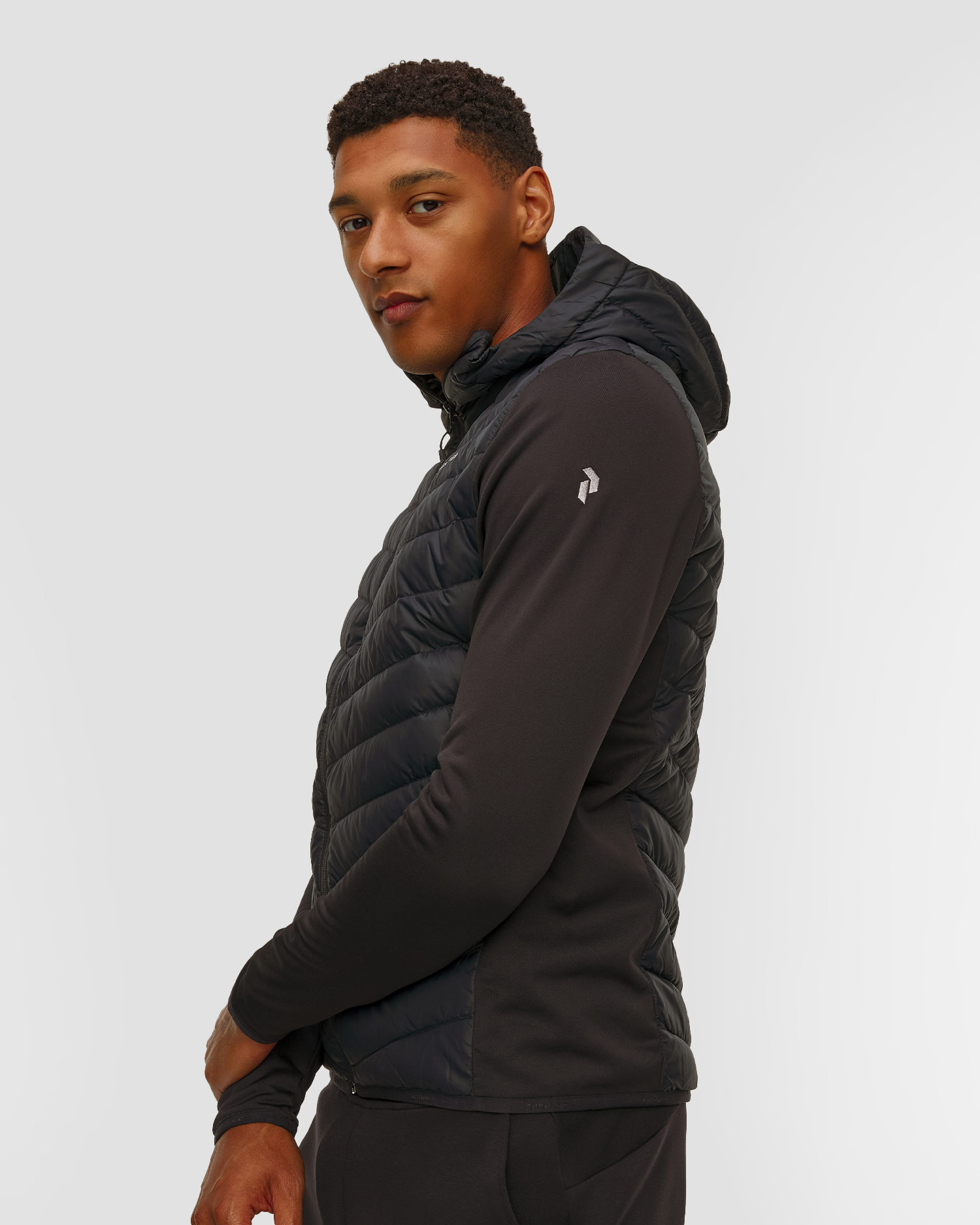 Pánska bunda Peak Performance Frost Down Hybrid Hood