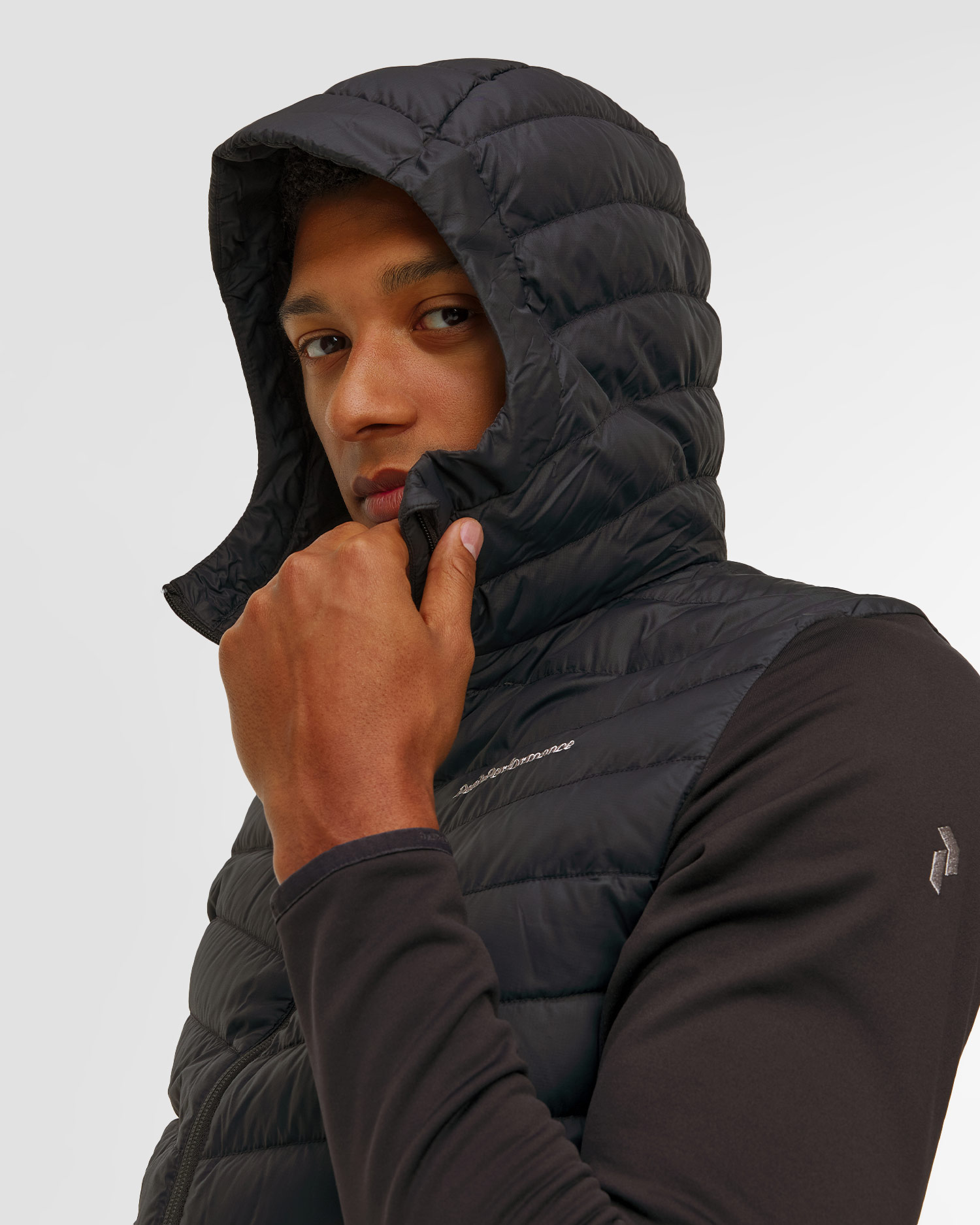 Pánska bunda Peak Performance Frost Down Hybrid Hood