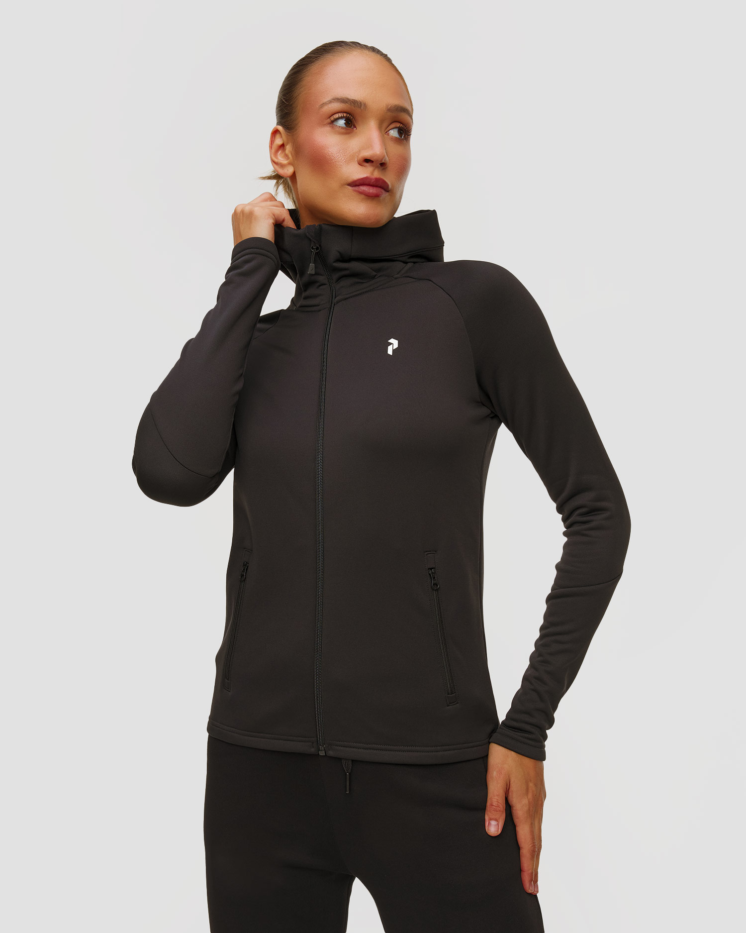 Peak Performance W Rider Essentials Zip Hood Kapuzenpullover für Damen in Schwarz