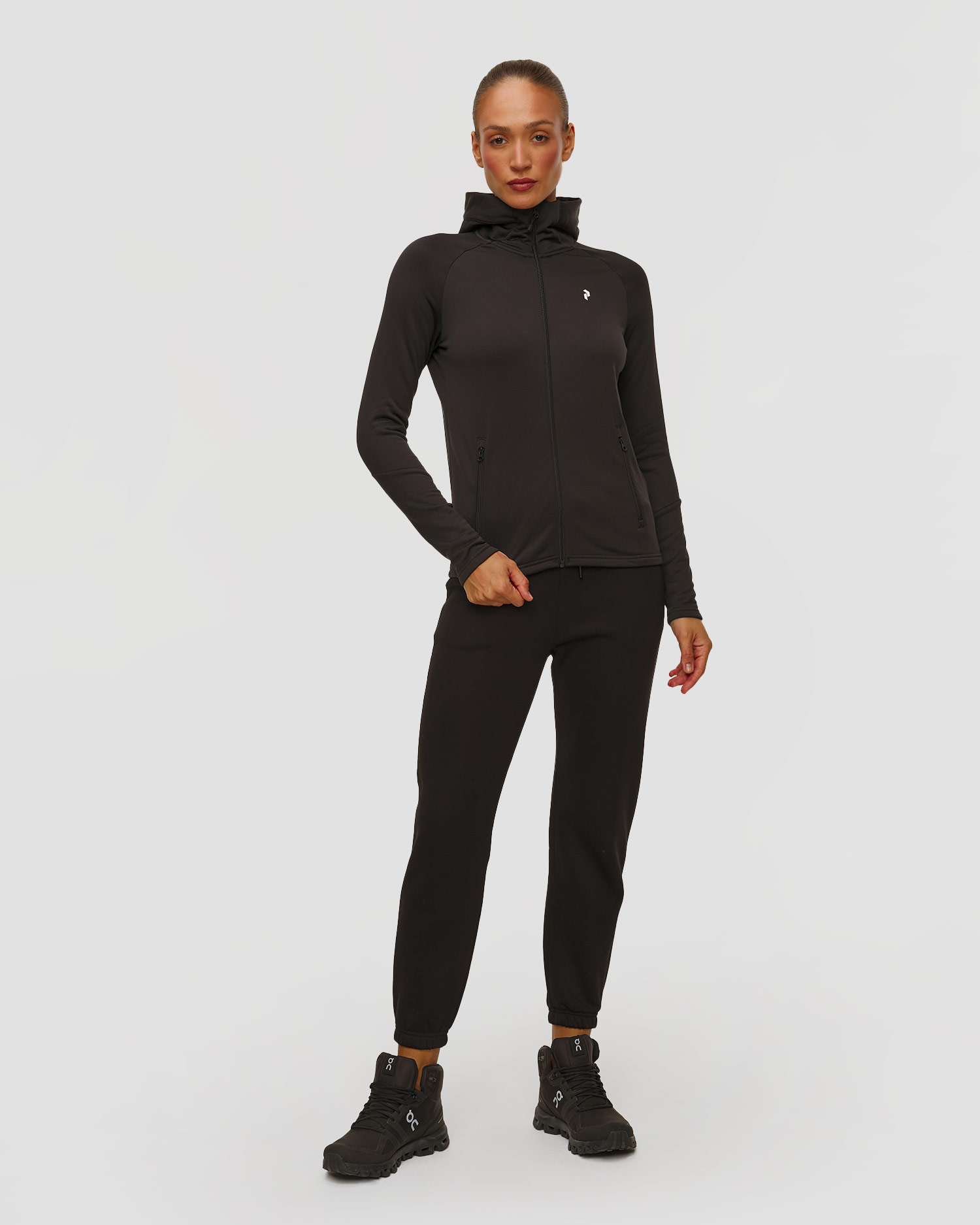 Peak Performance W Rider Essentials Zip Hood Kapuzenpullover für Damen in Schwarz