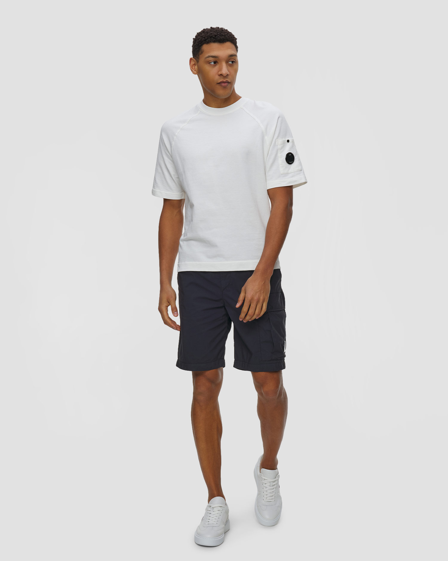 Pánské kapsáčové kraťasy C.P. Company 50 Fili Stretch Loose Lens Cargo Shorts v tmavě modré barvě