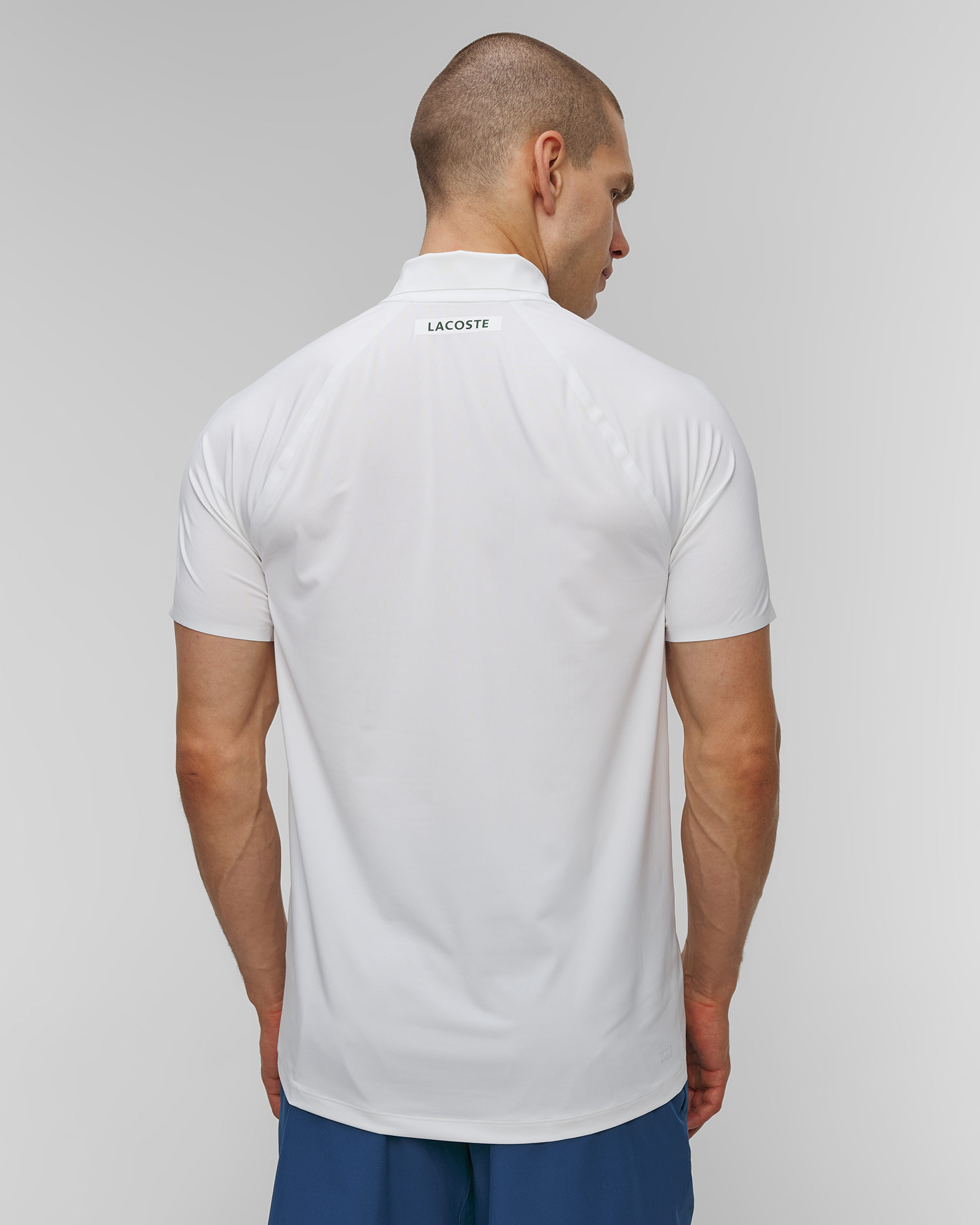 Białe polo męskie Lacoste Tennis x Novak Djokovic On Court