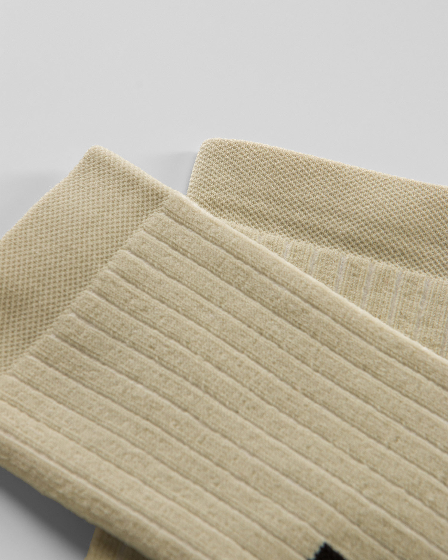 Black and beige Assos Trail Socks T3