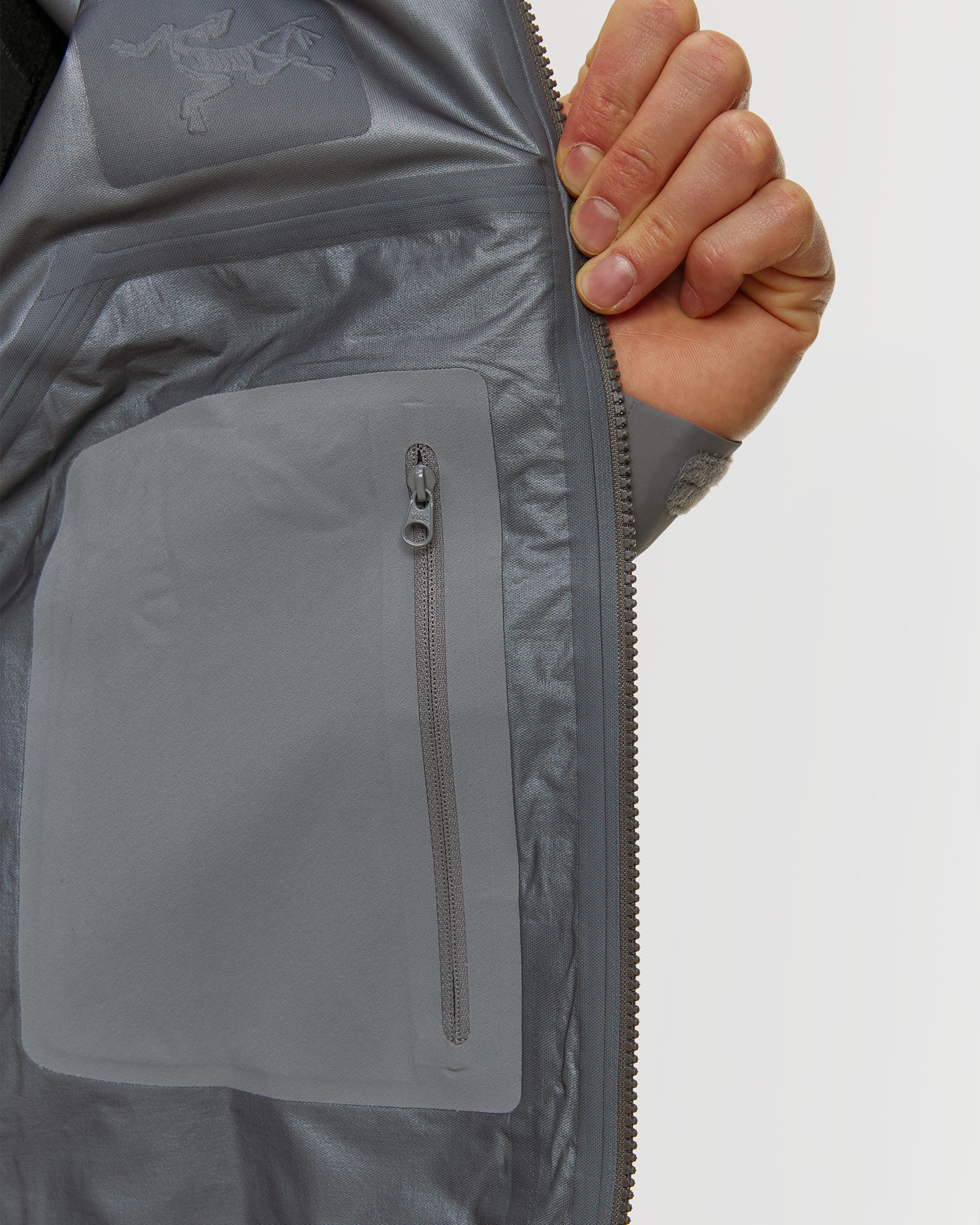 Hardshellová pánská bunda Arcteryx Beta SL Jacket v šedé barvě