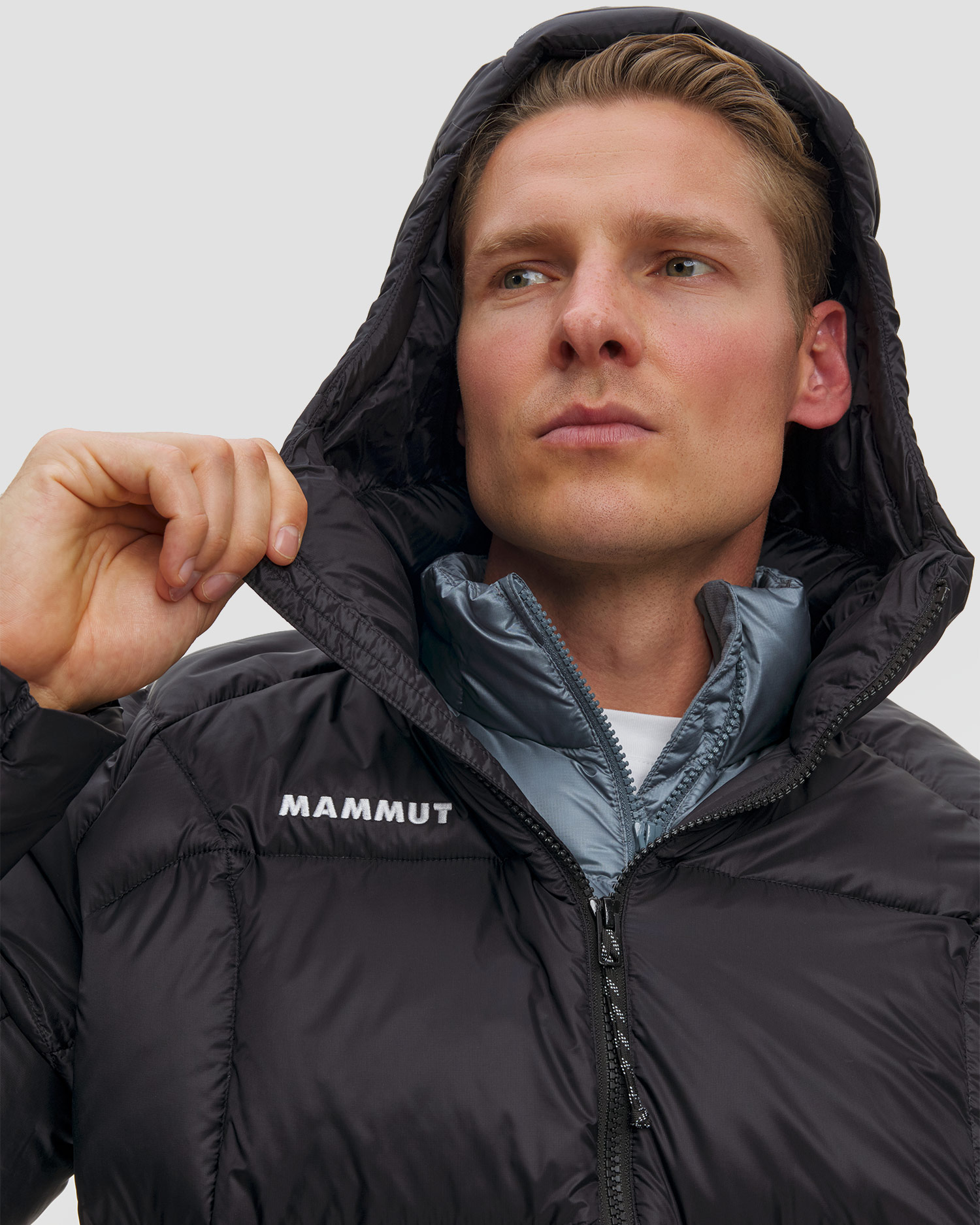 Pánska páperová bunda Mammut Glacier Glow IN Hooded Jacket Men čierna
