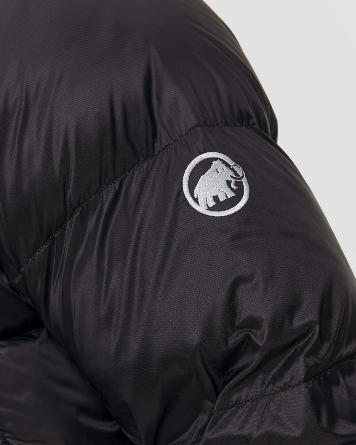 Pánska páperová bunda Mammut Glacier Glow IN Hooded Jacket Men čierna