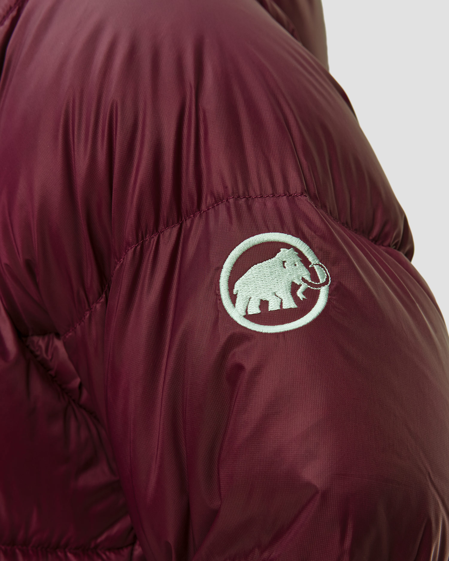 Dámská péřová bunda Mammut Glacier Glow IN Hooded Jacket Women v bordó barevném odstínu