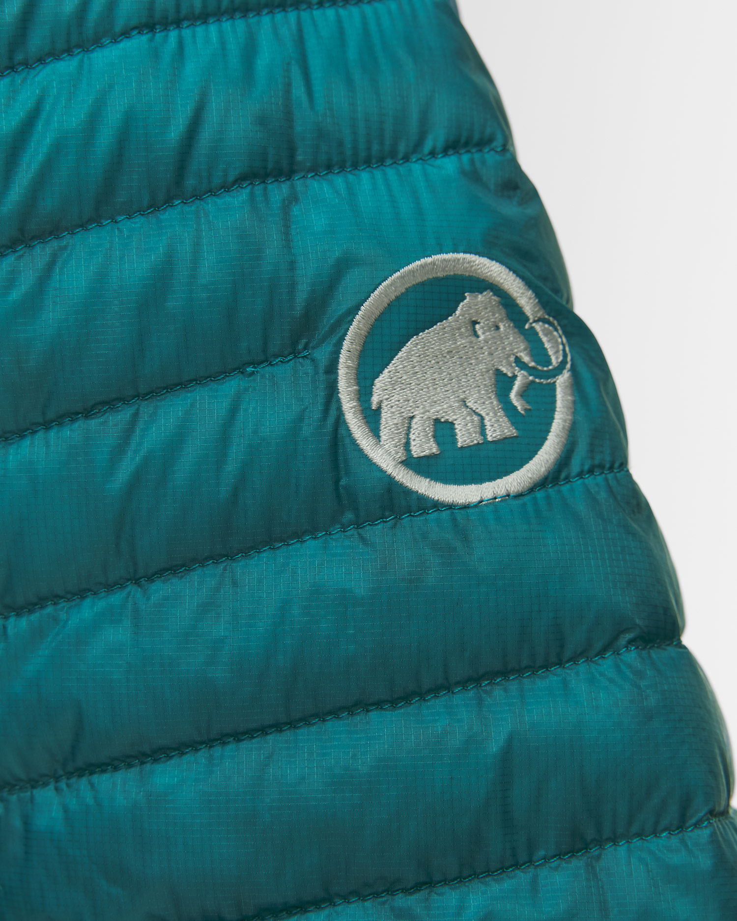 Dámská péřová bunda Mammut Broad Peak Light IN Hooded Jacket Women v tyrkysovém barevném odstínu