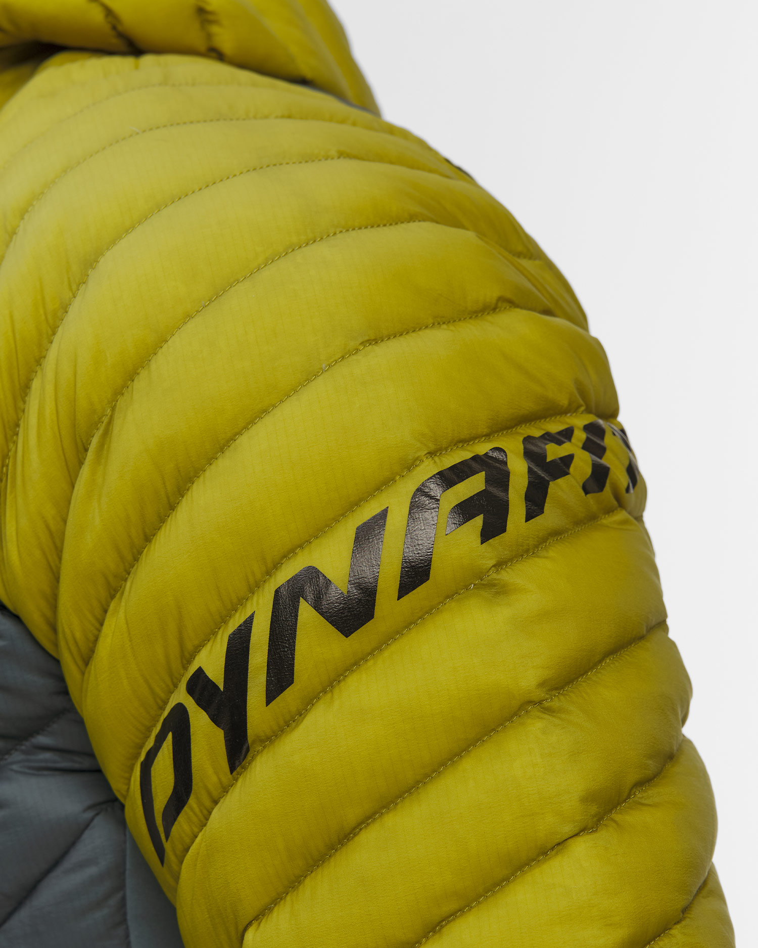 Dynafit Radical Down RDS M Hood Jkt Herren-Daunenjacke in Grau und Gelb