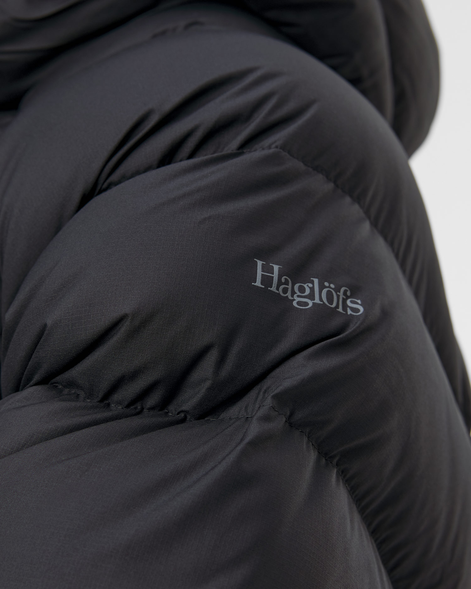 Dámska páperová bunda Haglofs Rosson Down Hood čierna