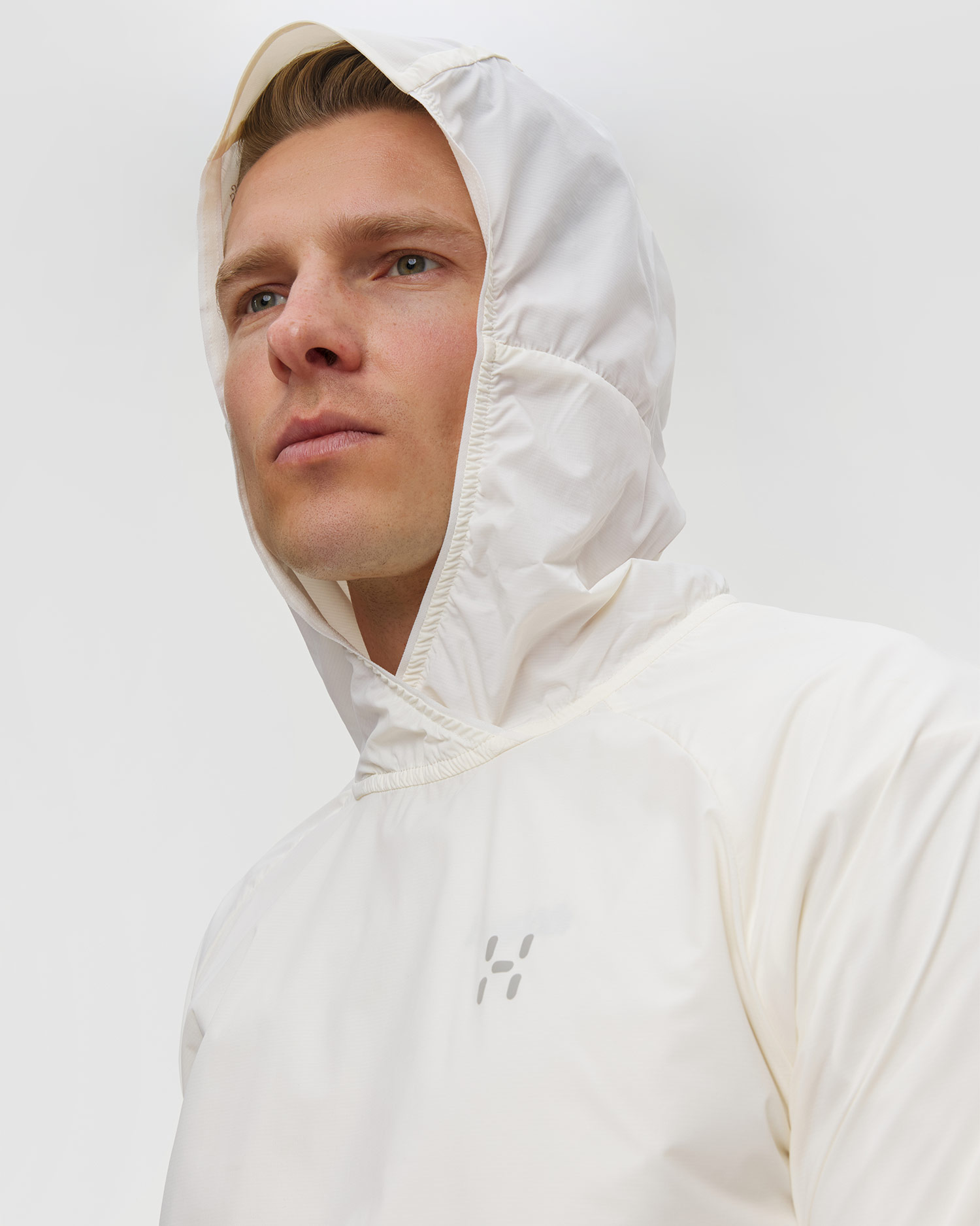 Pánska vetrovka Haglofs L.I.M Sunpack Hoodie biela