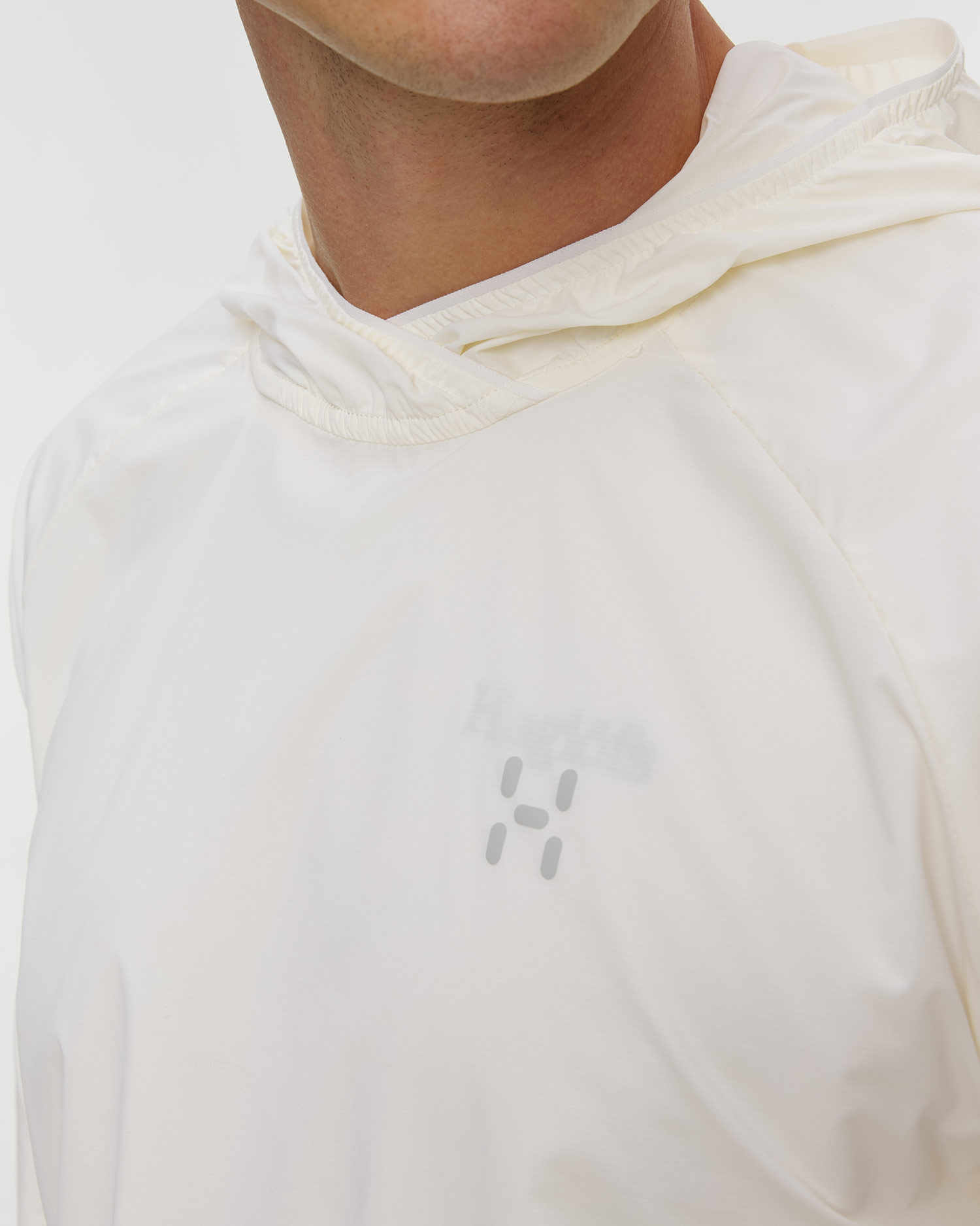 Pánska vetrovka Haglofs L.I.M Sunpack Hoodie biela