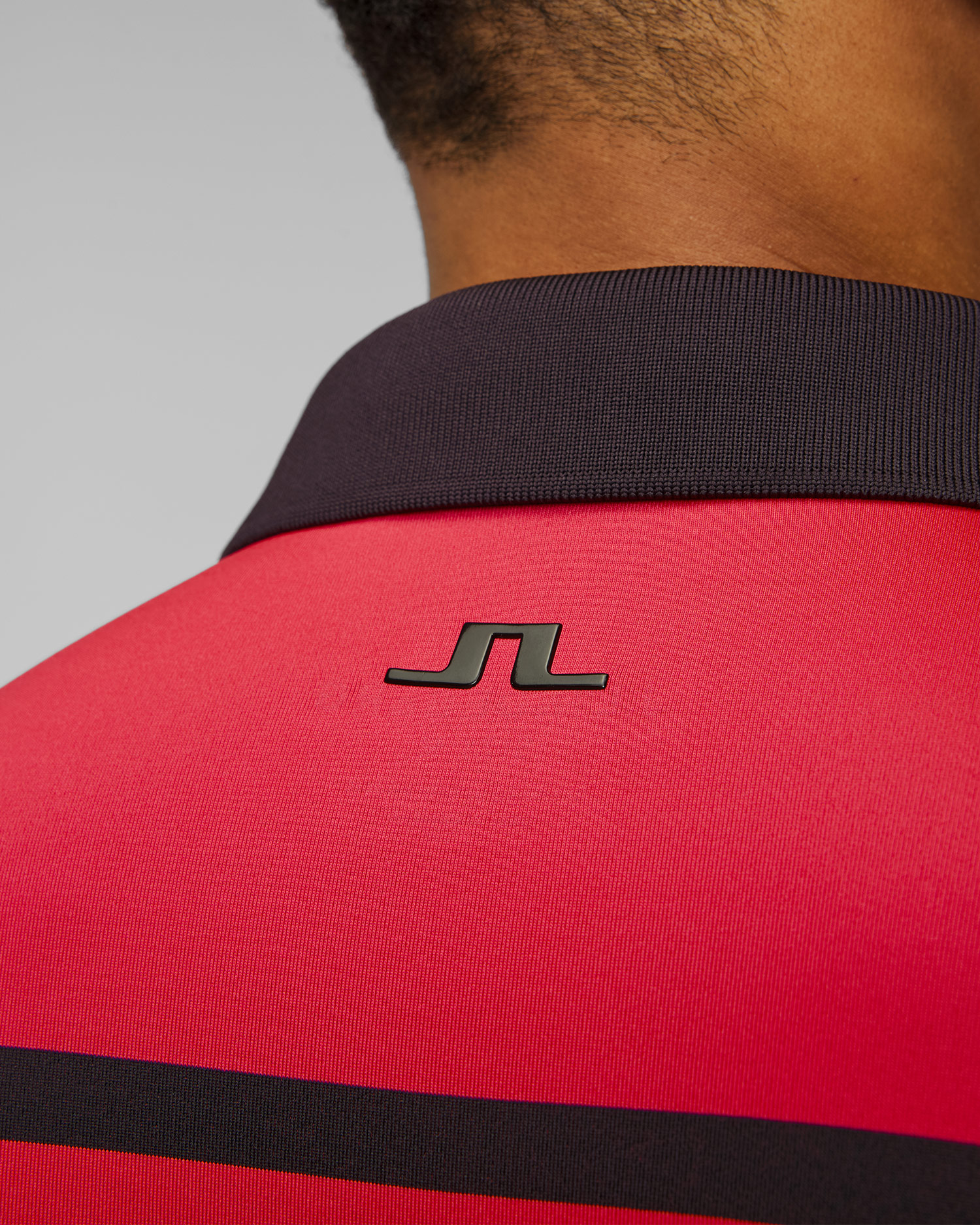 Polo technique bleu marine et rose pour hommes J.Lindeberg Olof Polo