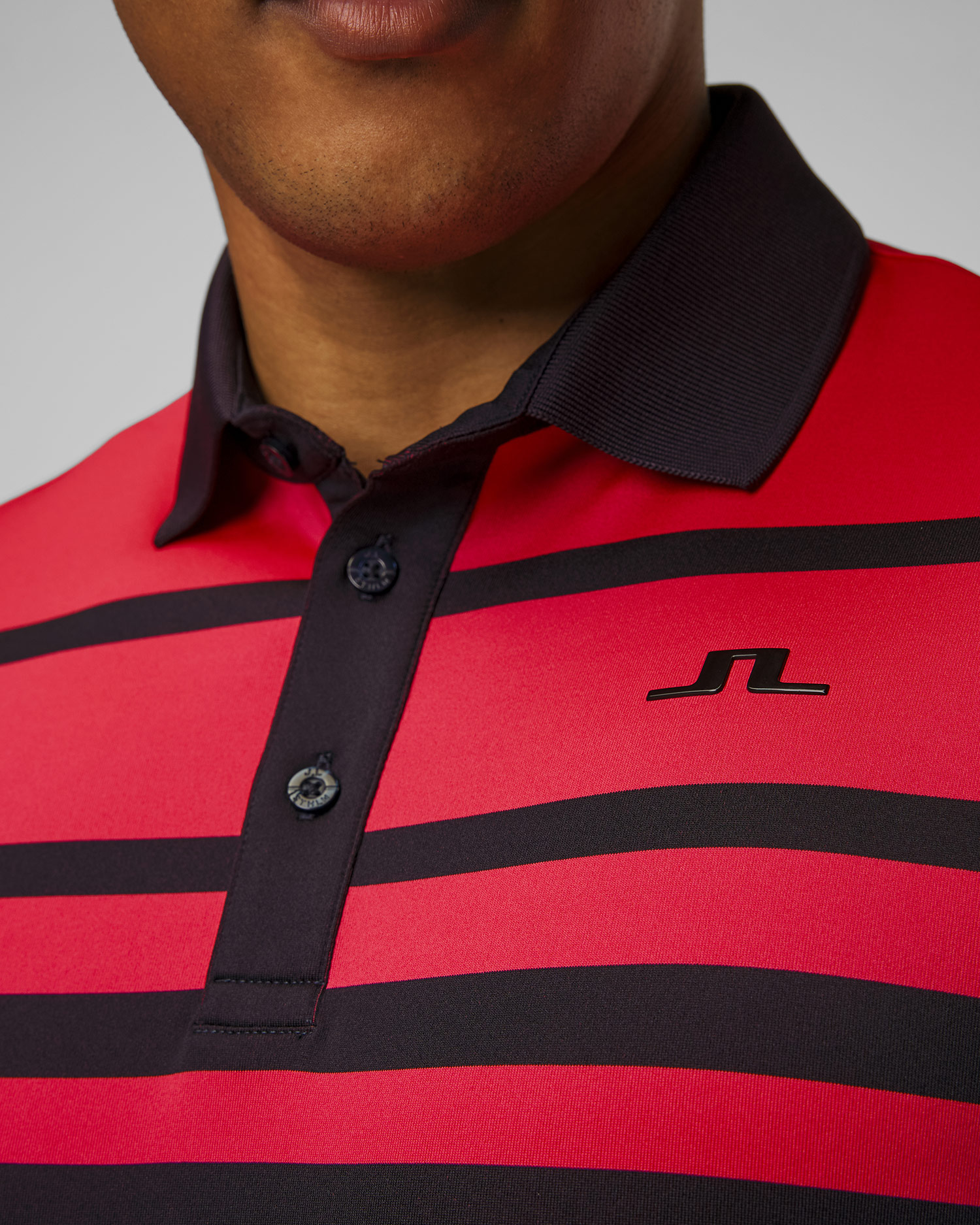 Polo technique bleu marine et rose pour hommes J.Lindeberg Olof Polo